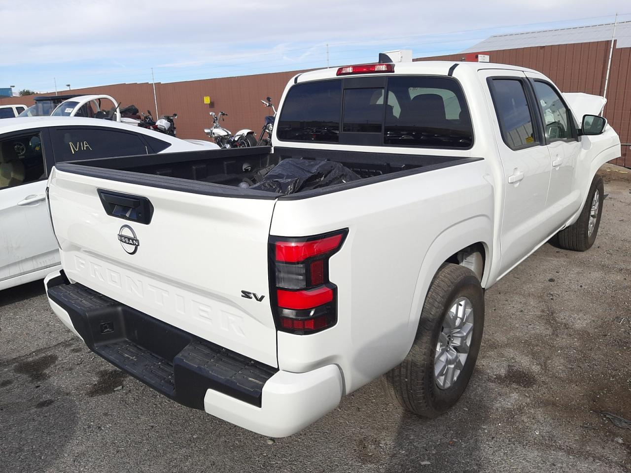 Photo 4 from auction – 2022 NISSAN FRONTIER S with VIN 1N6ED1EJ5NN616365