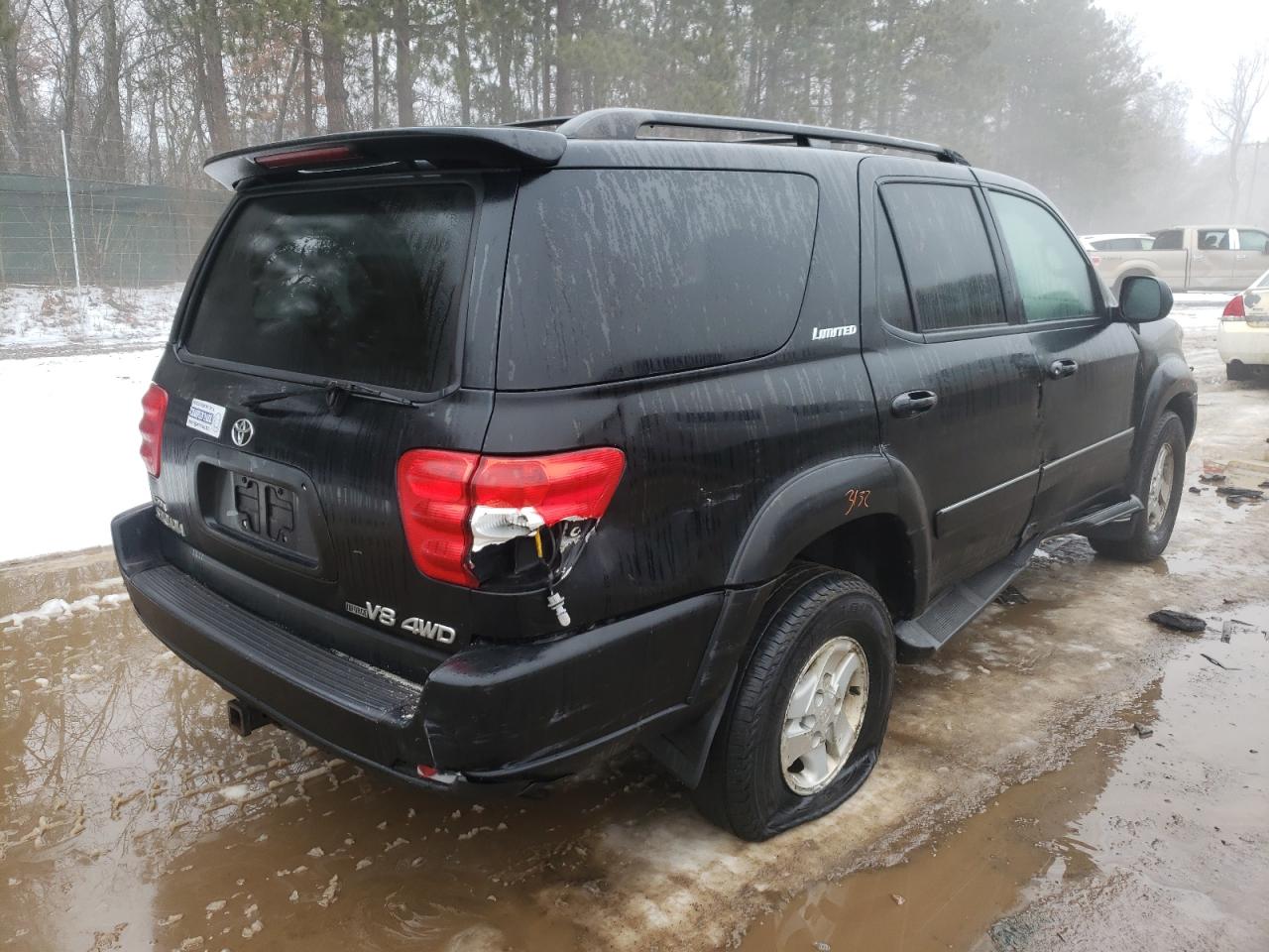 Photo 4 from auction – 2002 TOYOTA SEQUOIA LI with VIN 5TDBT48AX2S090598