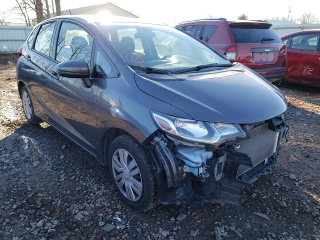 HONDA FIT LX 2017 with VIN JHMGK5H52HS002045 - Photo from auction
