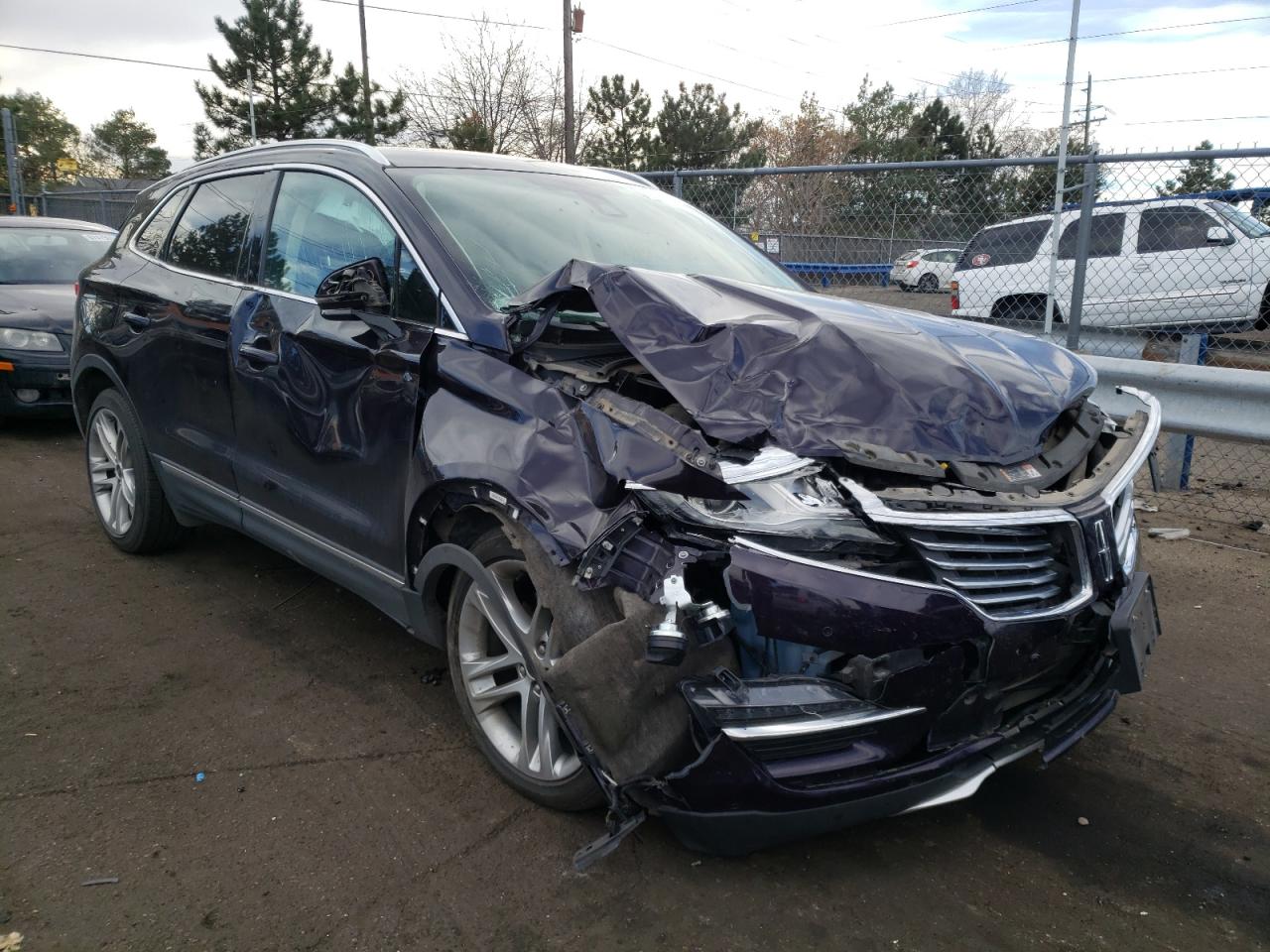 LINCOLN MKC 2015 with VIN 5LMCJ2A90FUJ32415 - Photo from auction