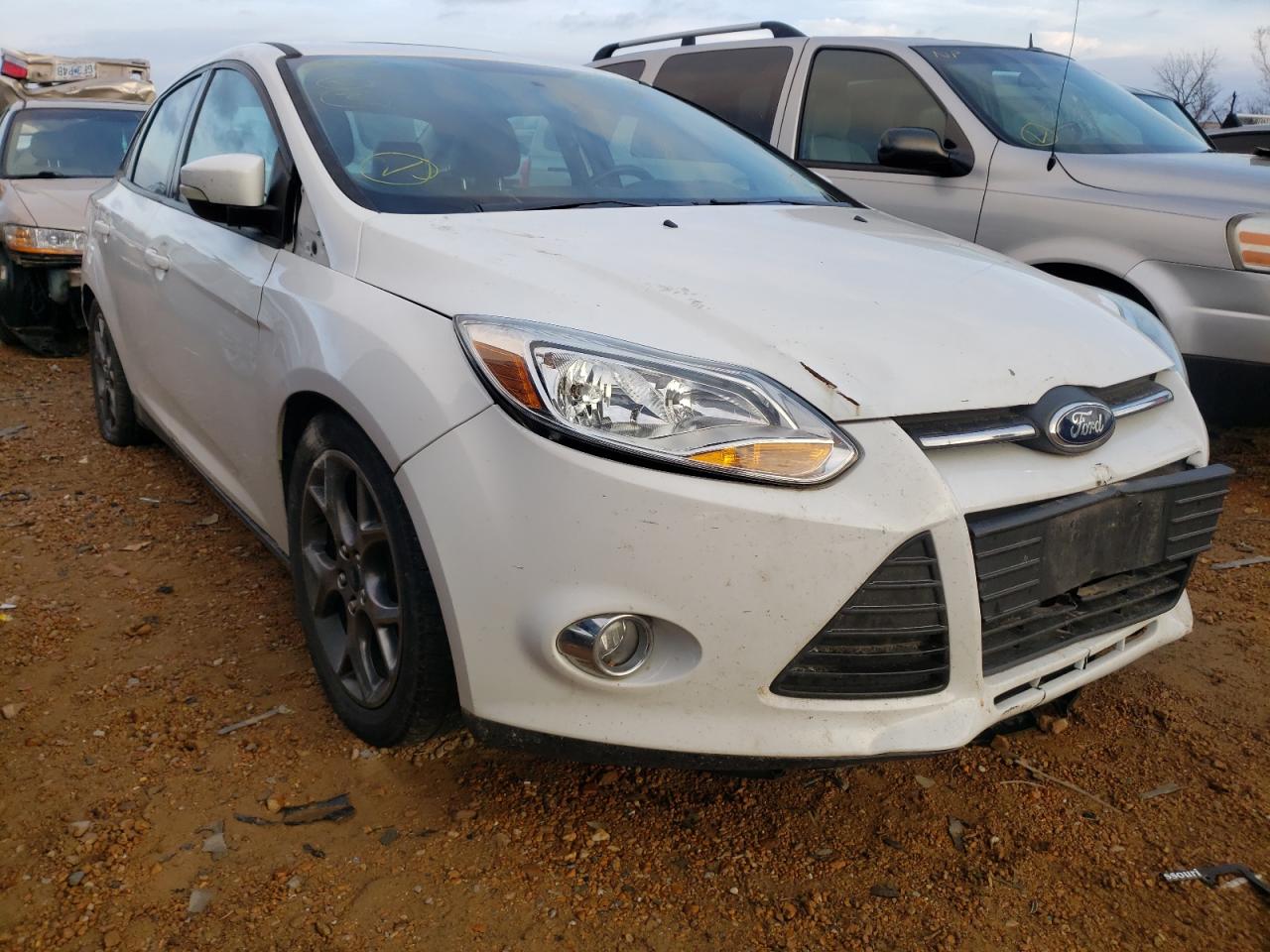 FORD FOCUS SE 2014 with VIN 1FADP3F26EL253410 - Photo from auction