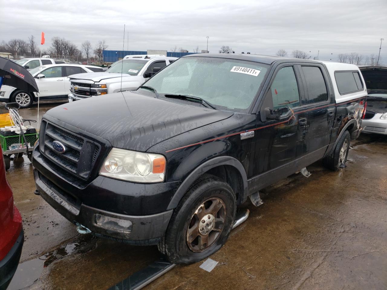 Photo 2 from auction – 2004 FORD F150 SUPER with VIN 1FTPW145X4KD62260