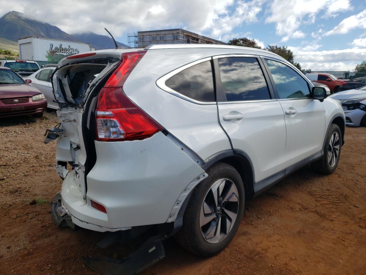 Photo 4 from auction – 2015 HONDA CR-V TOURI with VIN 5J6RM3H94FL025176