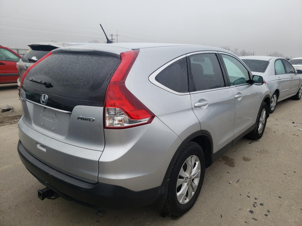Photo 4 from auction – 2014 HONDA CR-V EX with VIN 5J6RM4H52EL025792