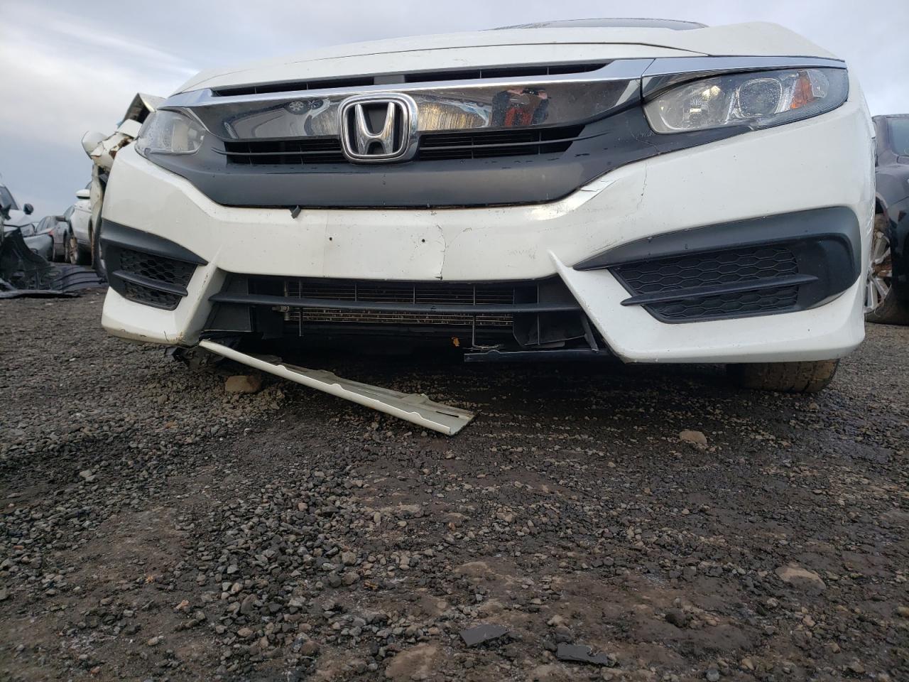 Photo 10 from auction – 2018 HONDA CIVIC EX with VIN 2HGFC2F72JH509698