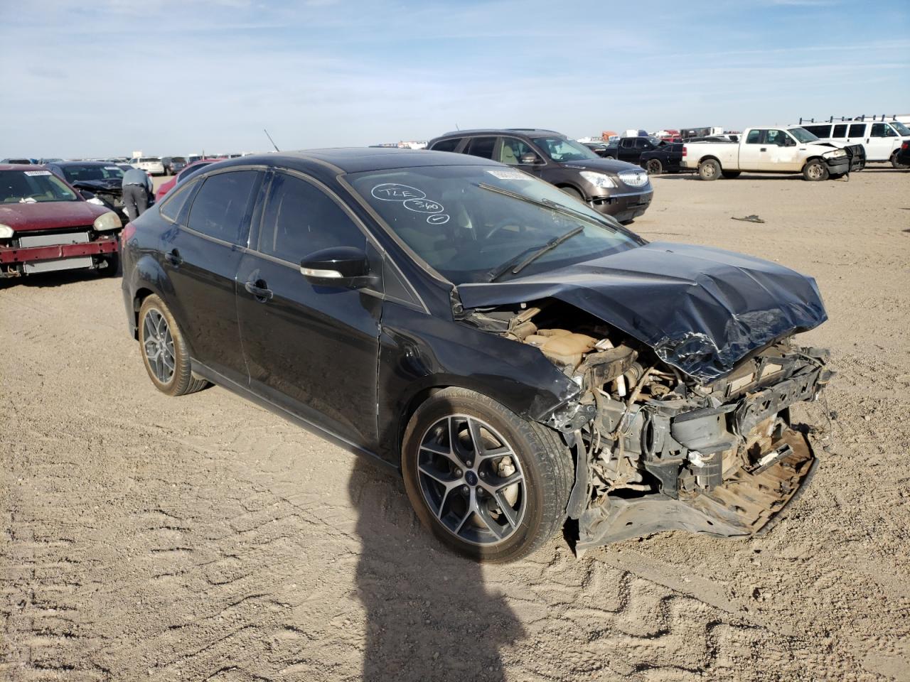 FORD FOCUS SEL 2017 z numerem VIN 1FADP3H25HL307863 - Zdjęcie z aukcji