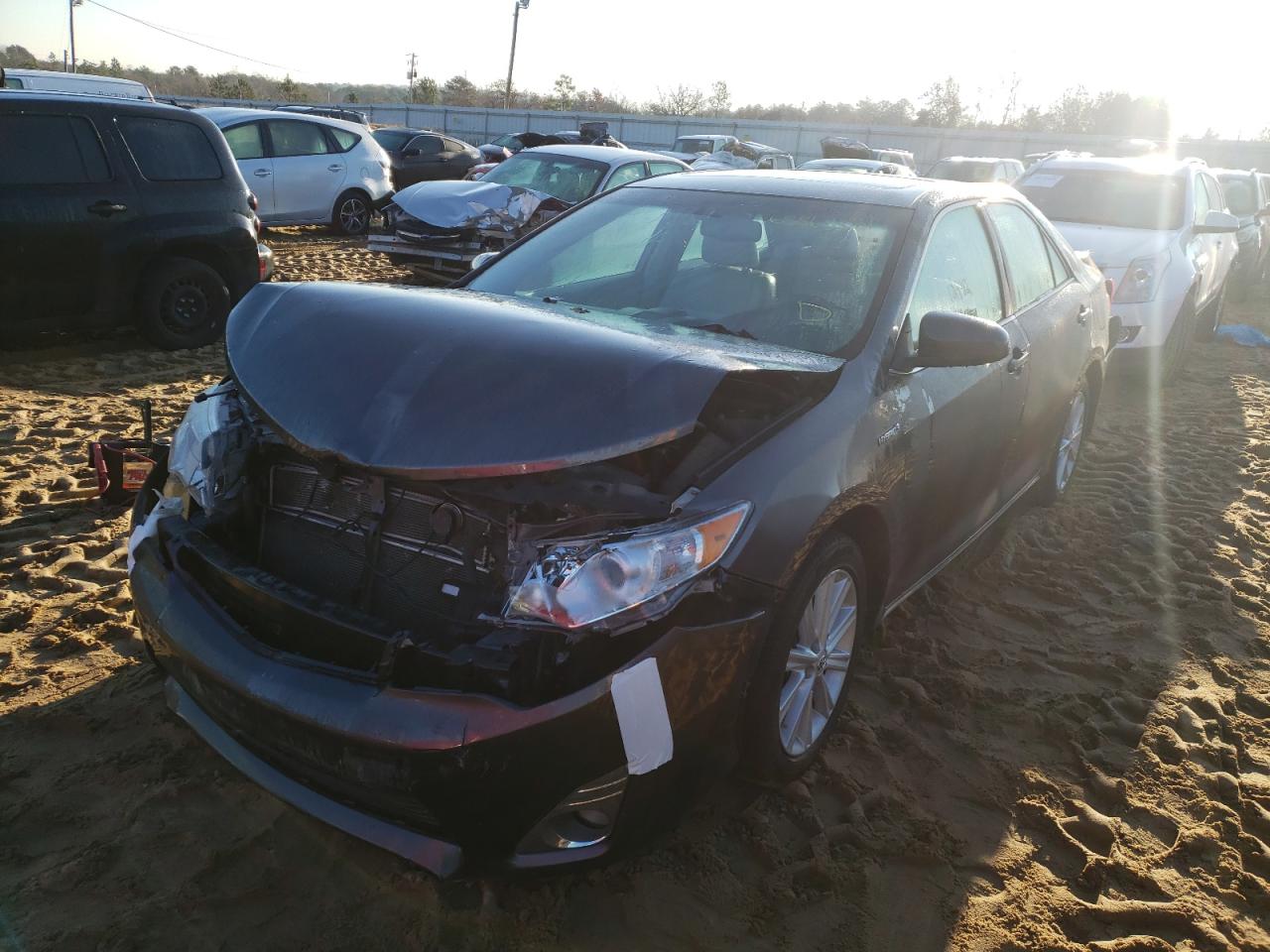 Photo 2 from auction – 2012 TOYOTA CAMRY HYBR with VIN 4T1BD1FKXCU027355