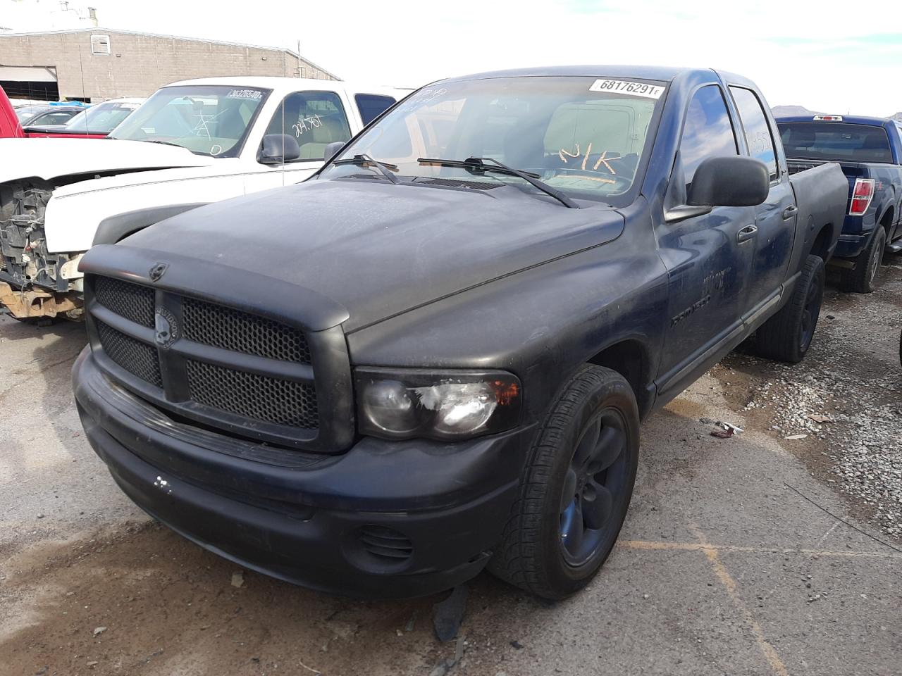 Photo 2 from auction – 2002 DODGE 1500 with VIN 1B7HA18N32J102329