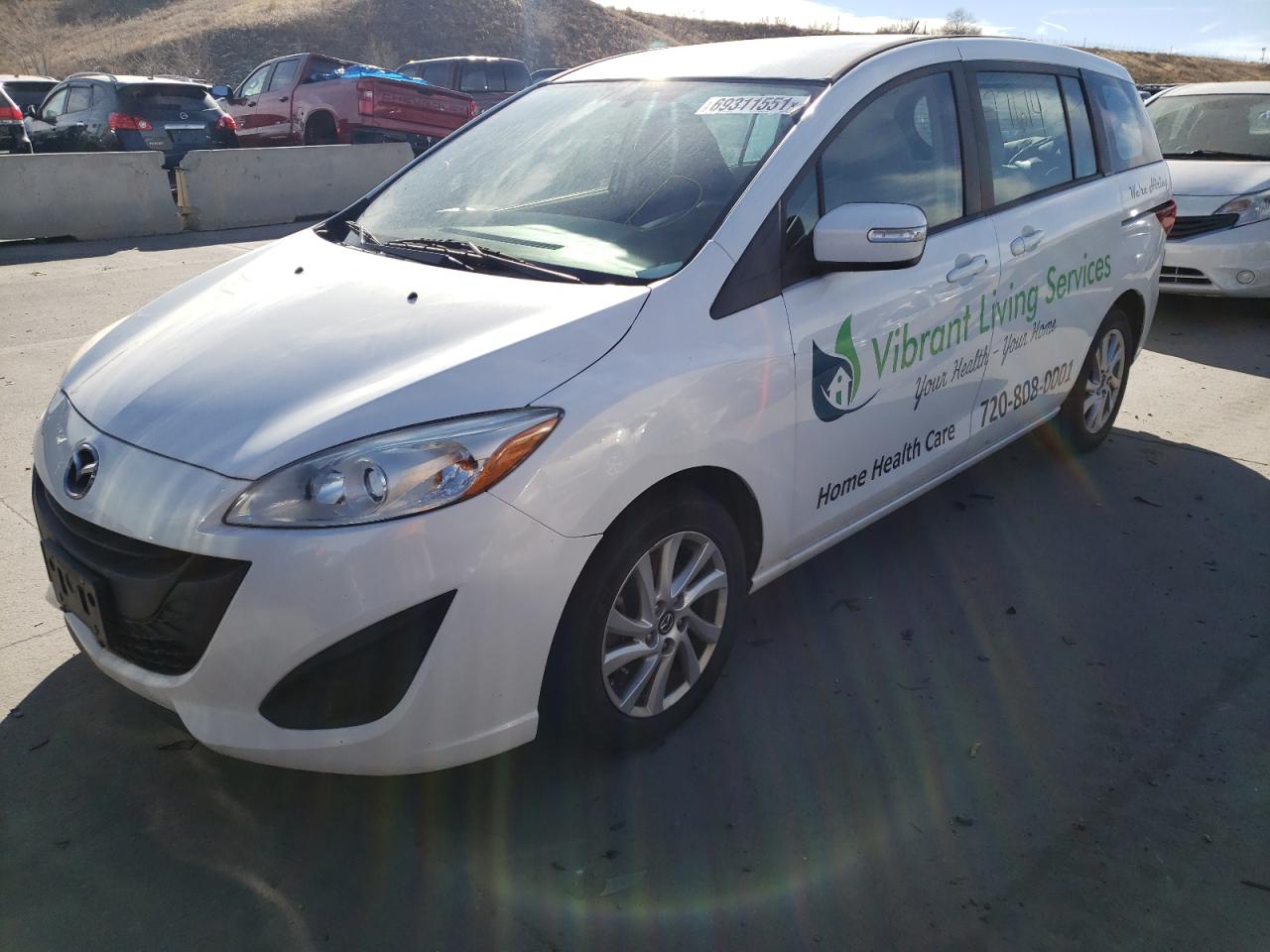 Photo 2 from auction – 2015 MAZDA 5 SPORT with VIN JM1CW2BL2F0186082