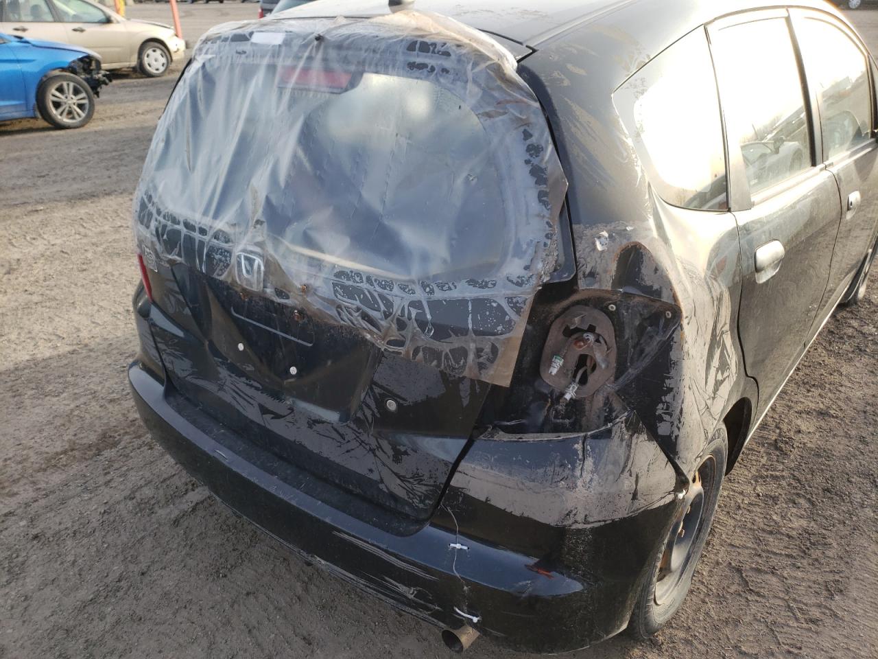 Photo 9 from auction – 2009 HONDA FIT with VIN JHMGE87259S805370