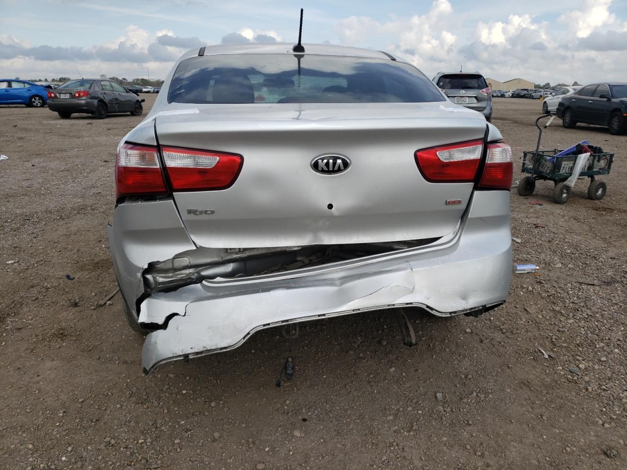Photo 9 from auction – 2013 KIA RIO LX with VIN KNADM4A3XD6236550