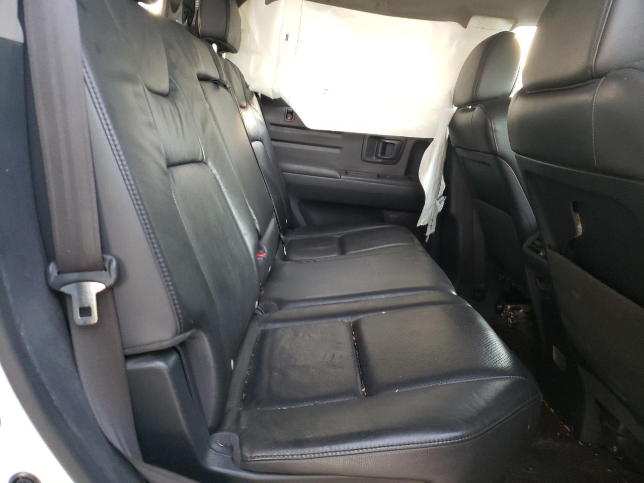 Photo 6 from auction – 2014 HONDA RIDGELINE with VIN 5FPYK1F67EB007610