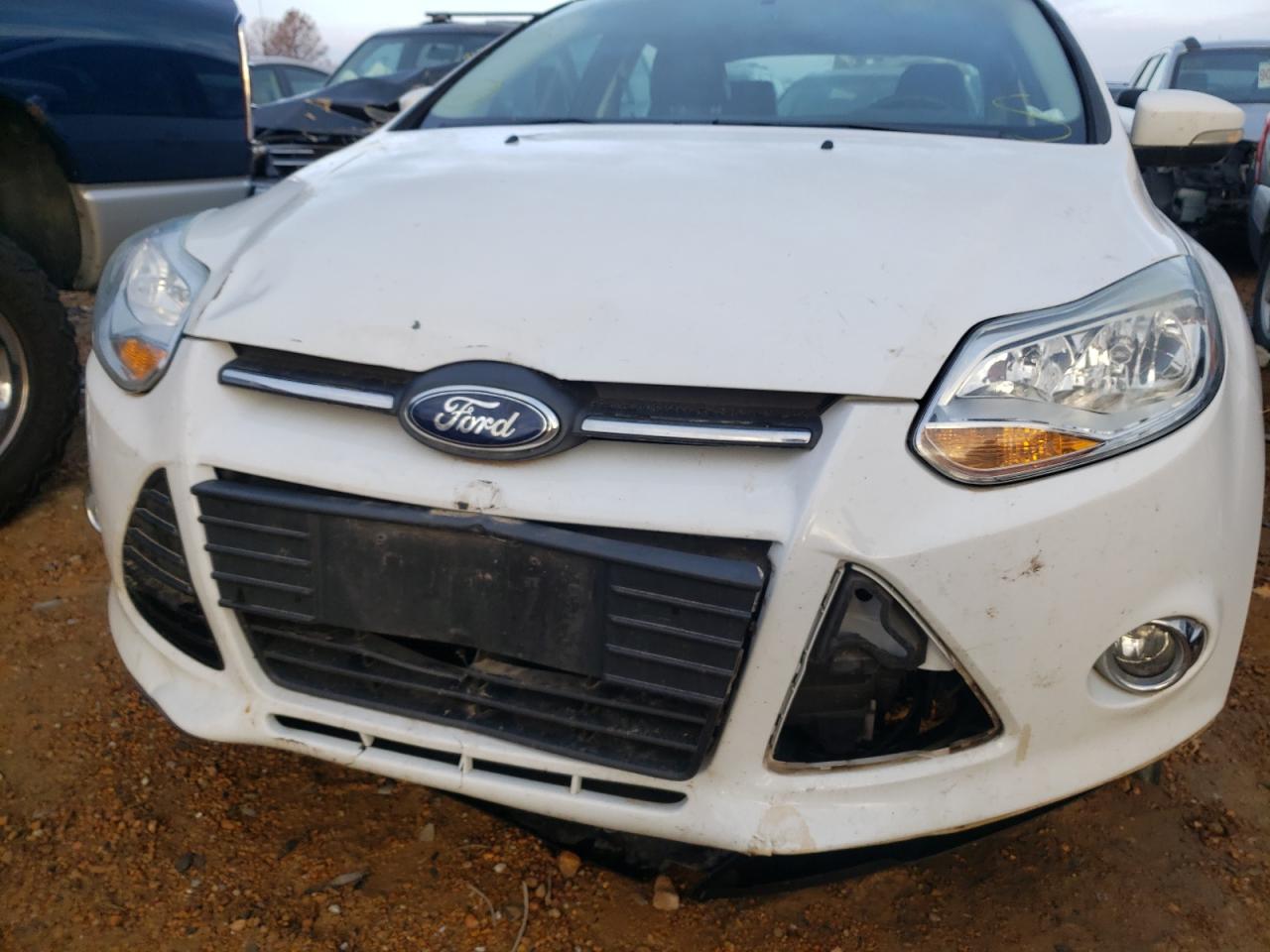 Photo 9 from auction – 2014 FORD FOCUS SE with VIN 1FADP3F26EL253410