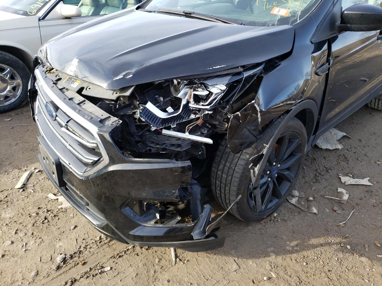 Photo 9 from auction – 2017 FORD ESCAPE SE with VIN 1FMCU9G98HUB22308
