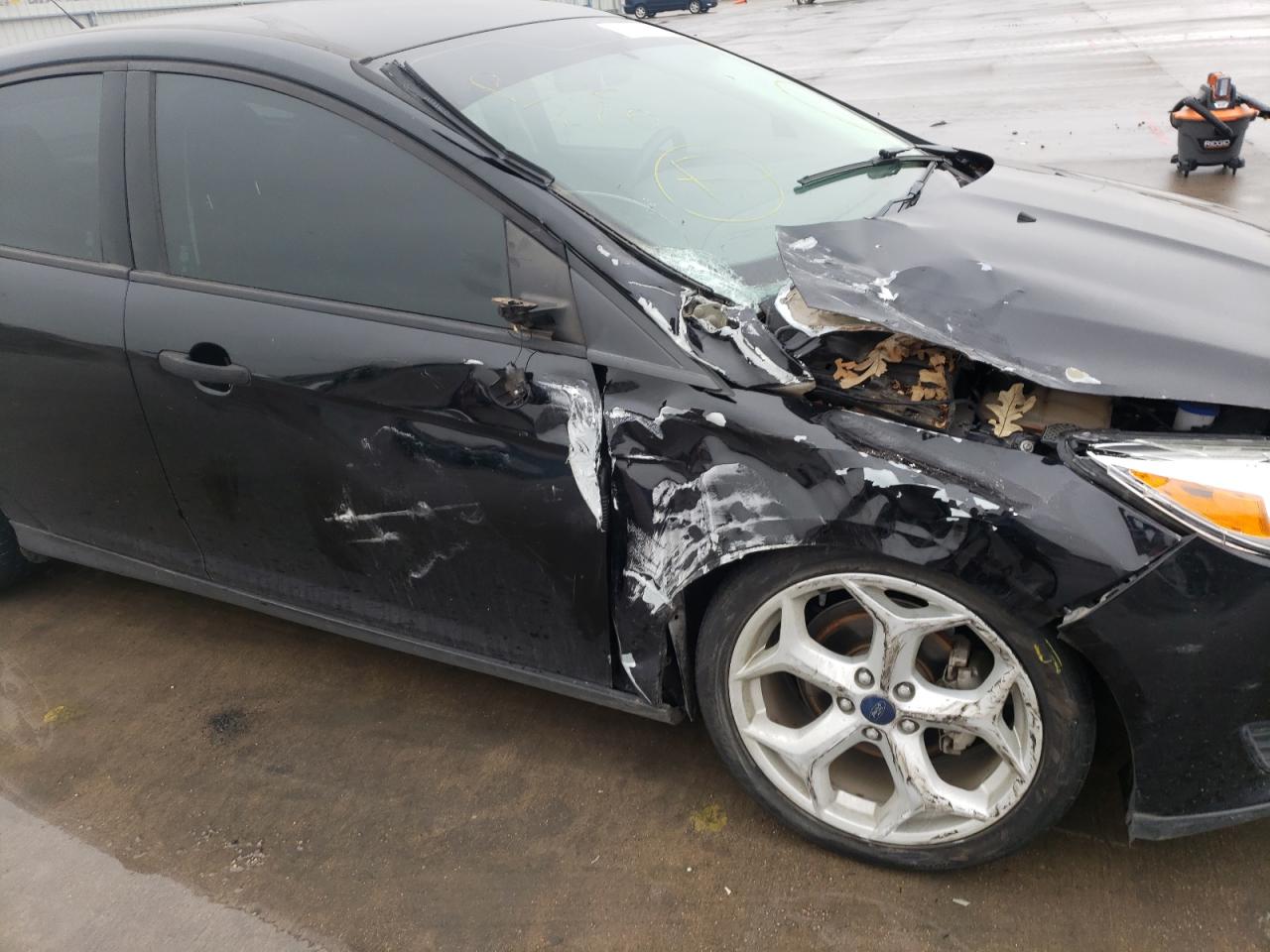 Photo 9 from auction – 2016 FORD FOCUS S with VIN 1FADP3E2XGL208703