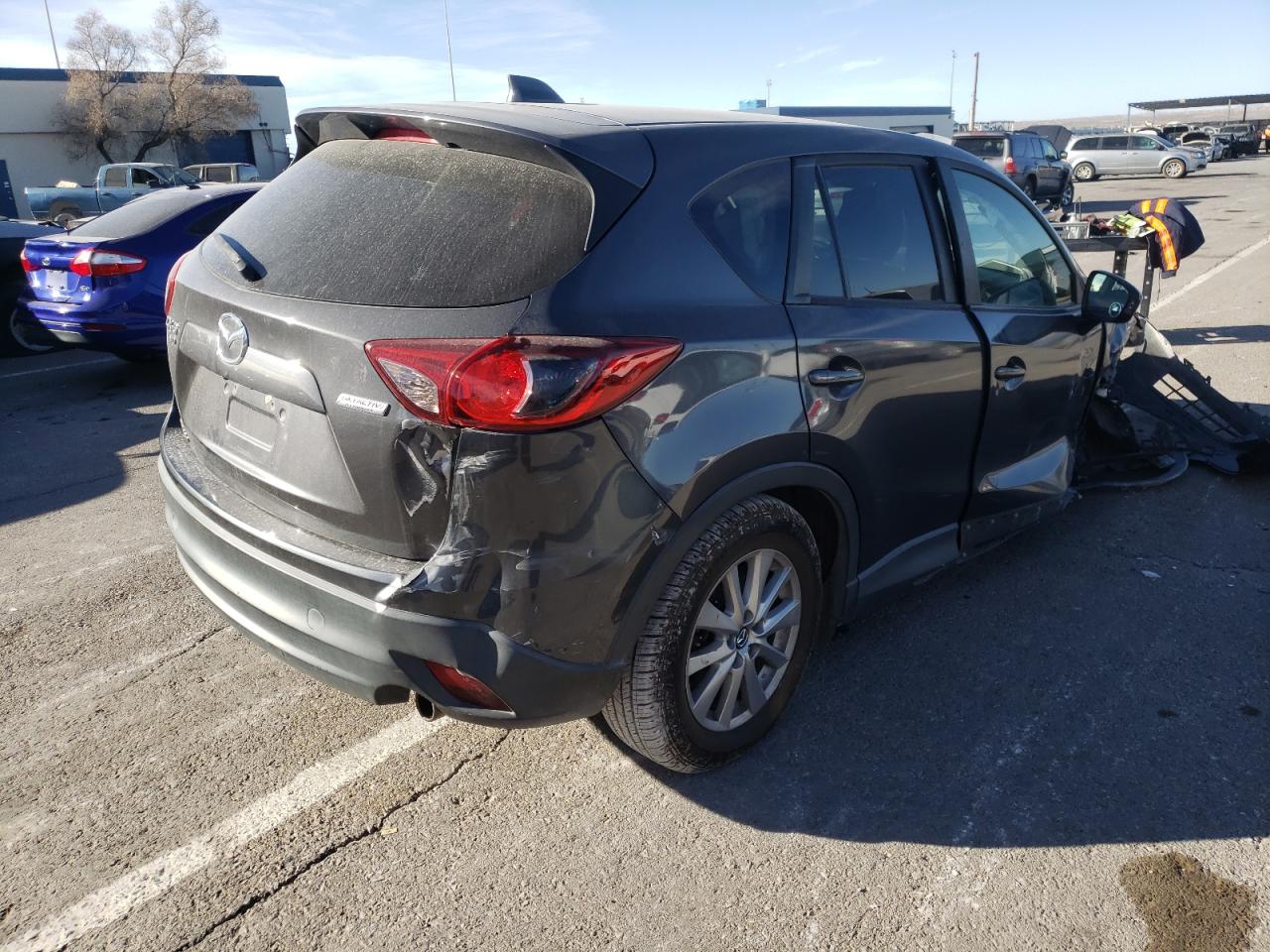Photo 4 from auction – 2014 MAZDA CX-5 TOURI with VIN JM3KE4CY7E0406178