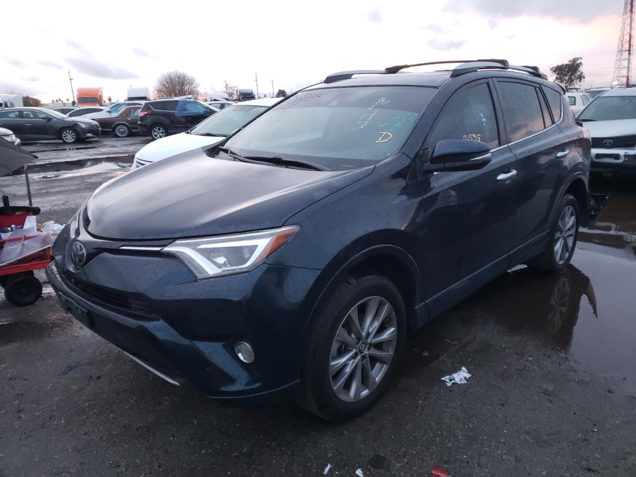 Photo 2 from auction – 2017 TOYOTA RAV4 LIMIT with VIN 2T3YFREVXHW323604