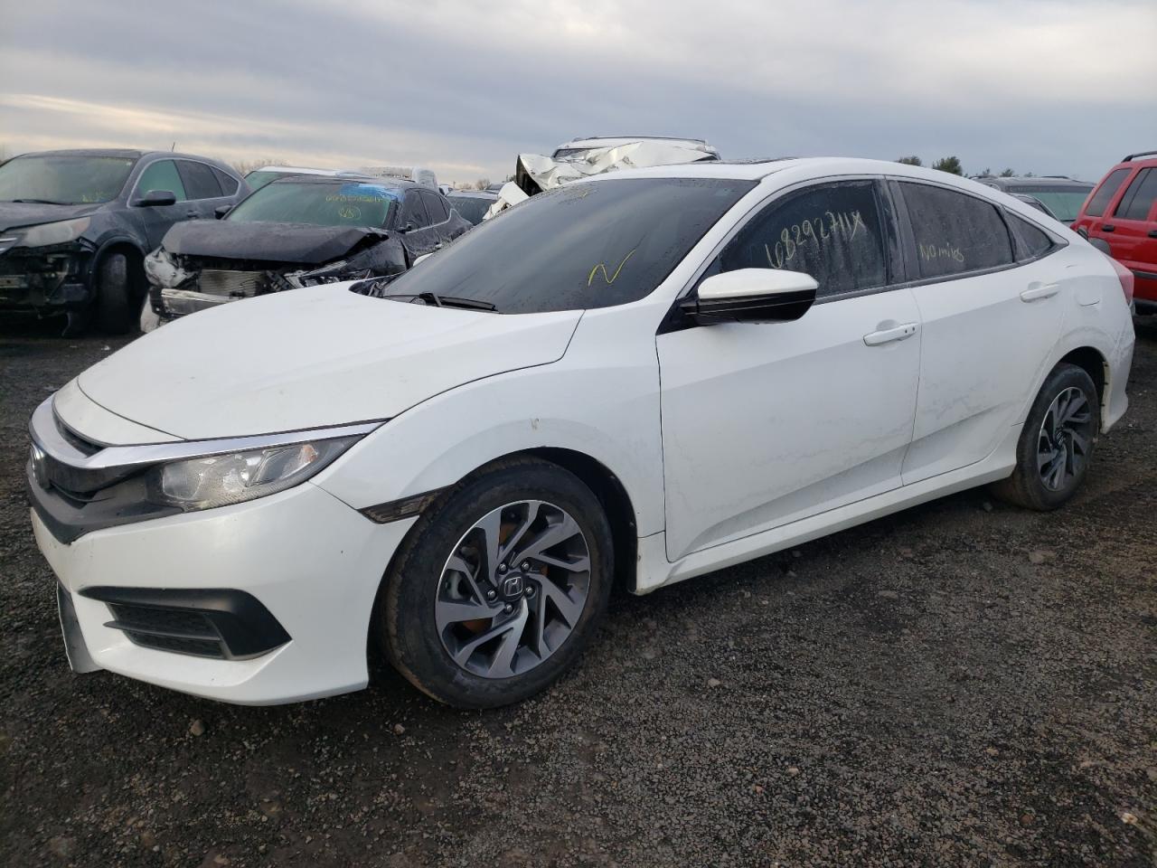 Photo 2 from auction – 2018 HONDA CIVIC EX with VIN 2HGFC2F72JH509698