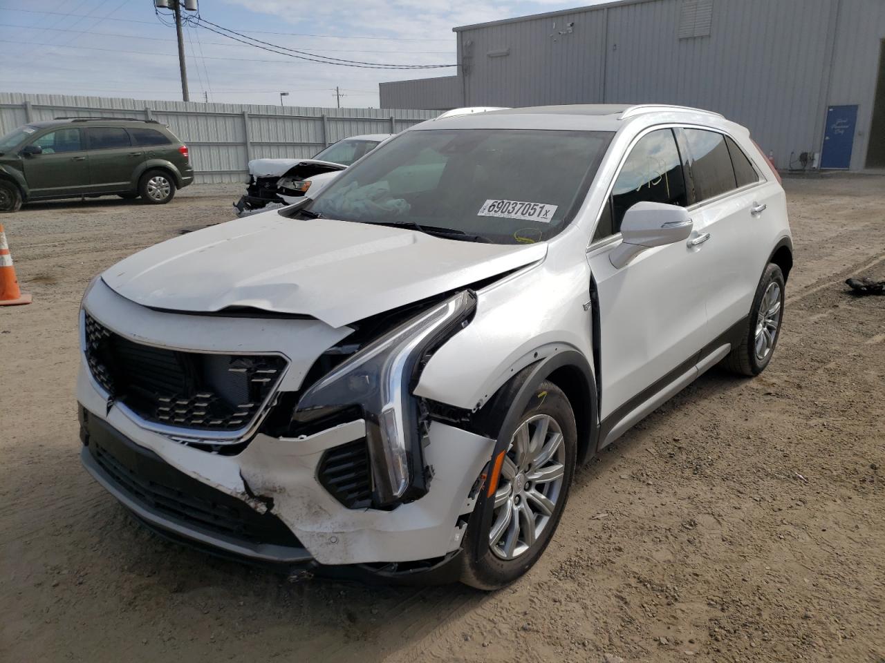 Photo 2 from auction – 2021 CADILLAC XT4 PREMIU with VIN 1GYFZCR49MF037567