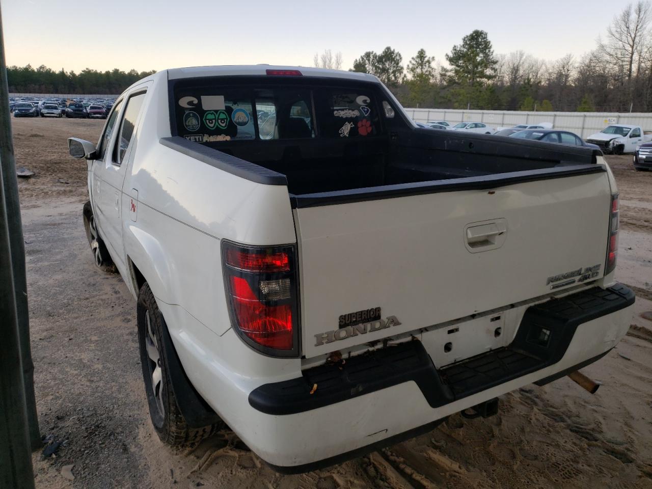 Photo 3 from auction – 2014 HONDA RIDGELINE with VIN 5FPYK1F67EB007610