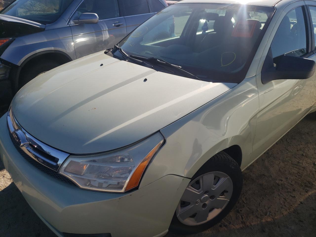 Photo 9 from auction – 2010 FORD FOCUS S with VIN 1FAHP3EN3AW129200