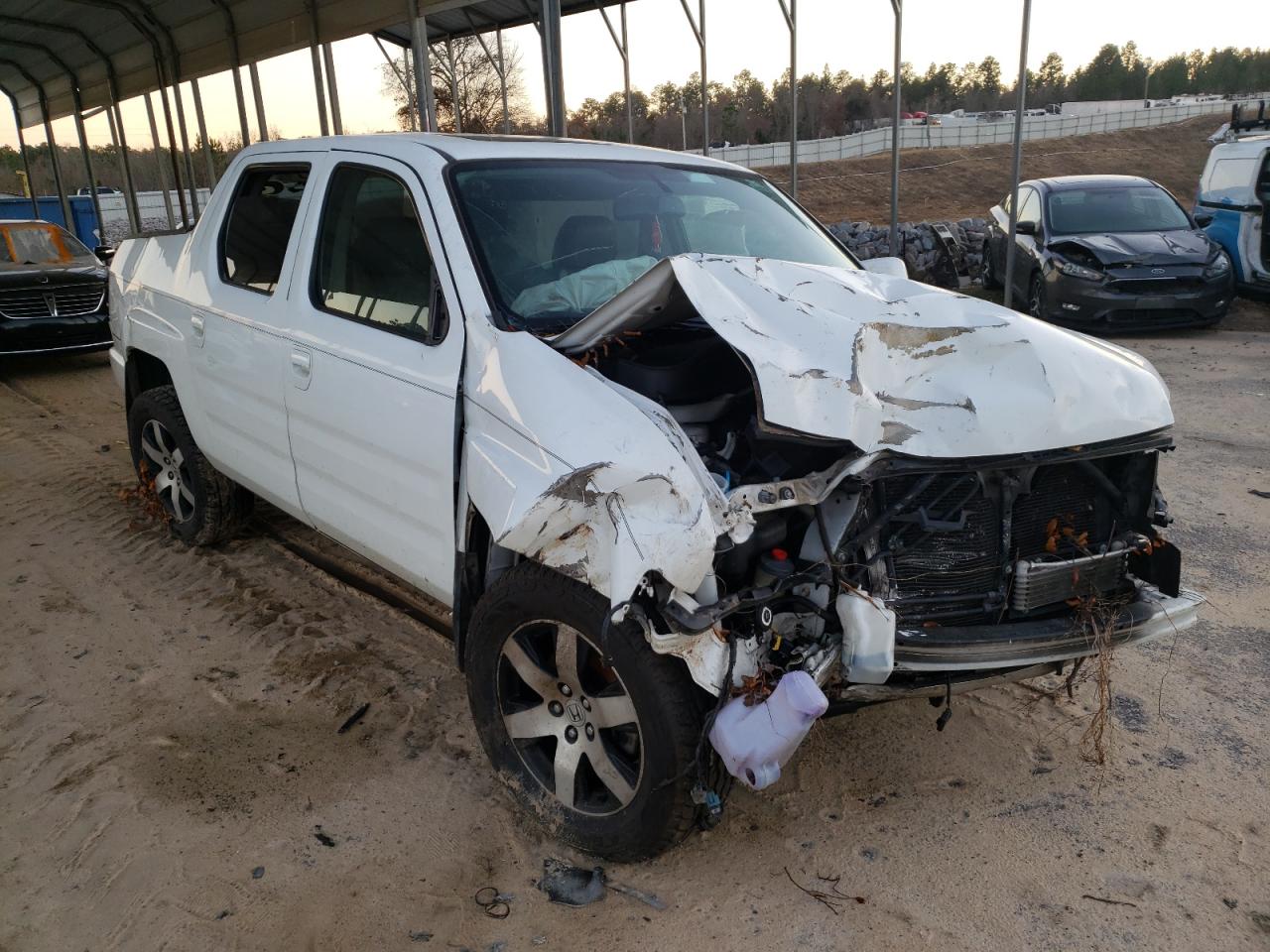 HONDA RIDGELINE 2014 with VIN 5FPYK1F67EB007610 - Photo from auction