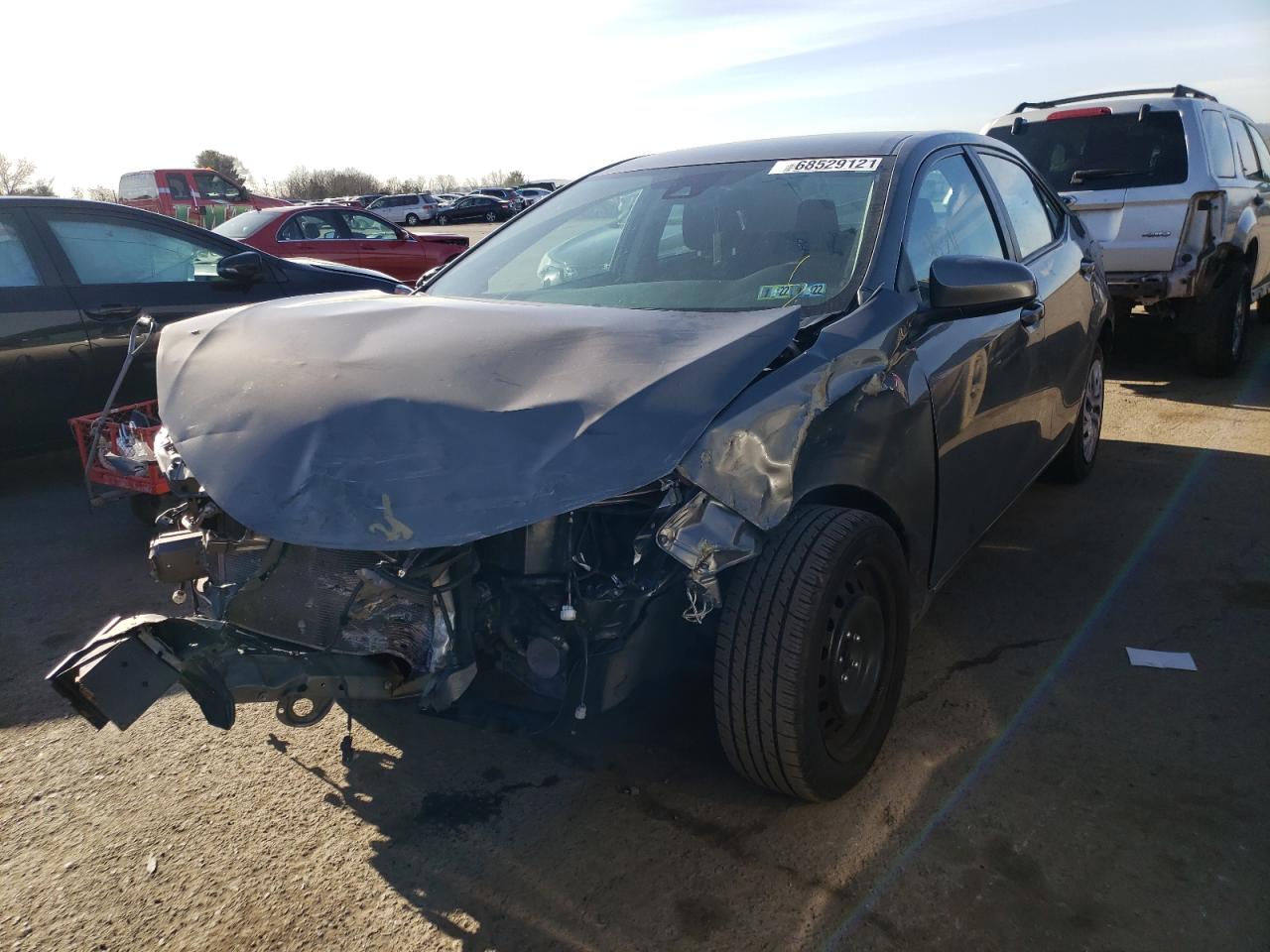 Photo 2 from auction – 2019 TOYOTA COROLLA L with VIN 2T1BURHE1KC183953