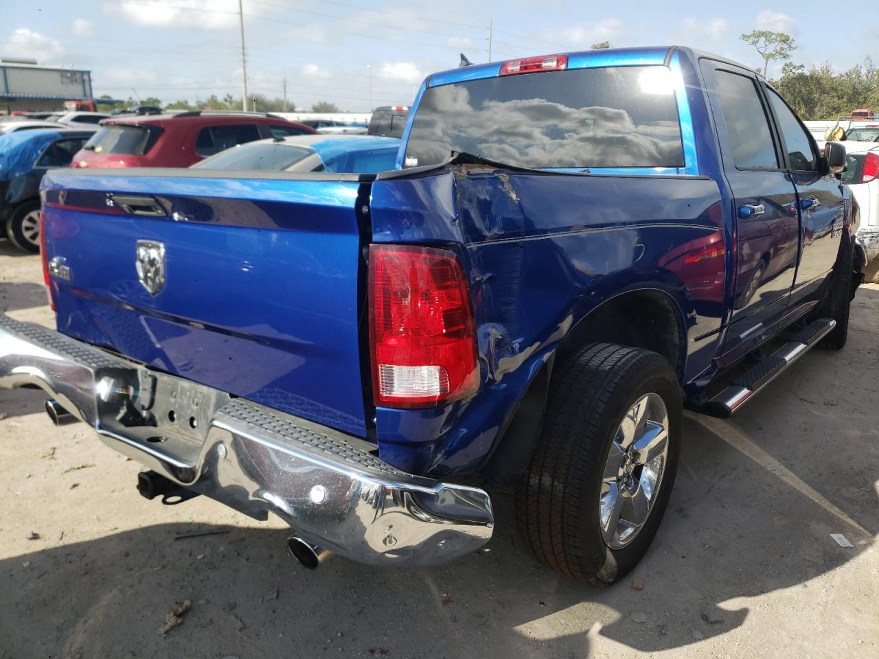 Photo 4 from auction – 2016 RAM 1500 SLT with VIN 1C6RR6LT4GS209852
