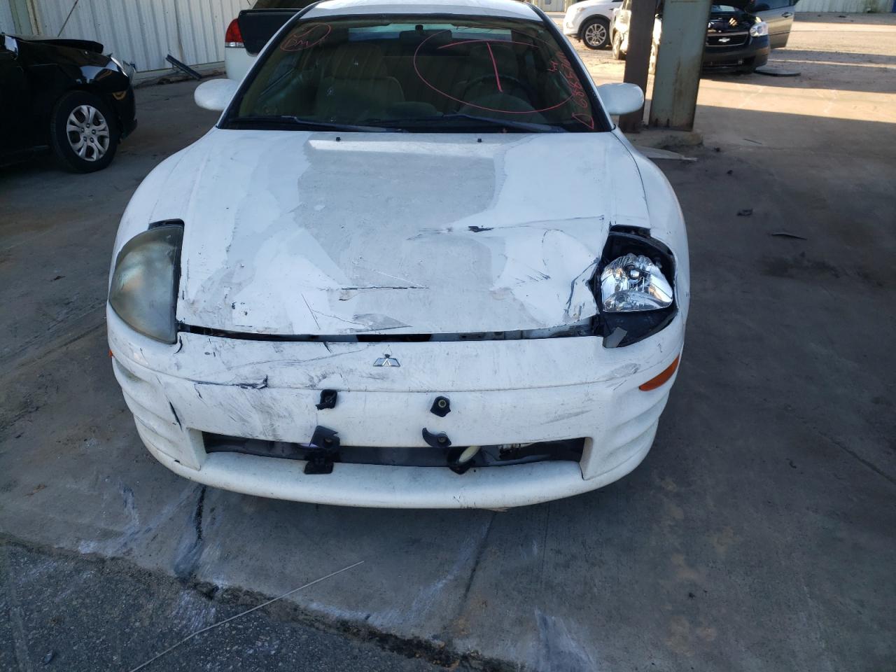 Photo 9 from auction – 2000 MITSUBISHI ECLIPSE RS with VIN 4A3AC34G8YE104798
