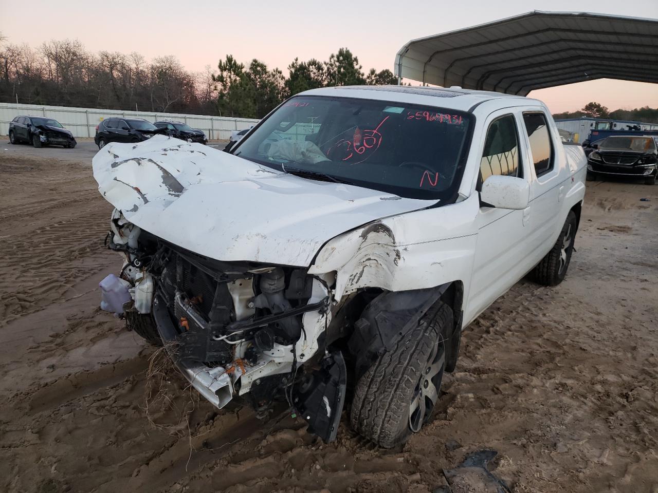 Photo 2 from auction – 2014 HONDA RIDGELINE with VIN 5FPYK1F67EB007610