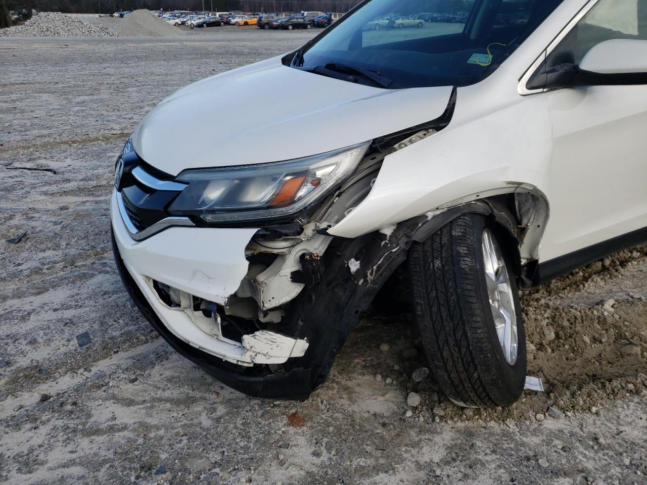 Photo 9 from auction – 2015 HONDA CR-V EXL with VIN 5J6RM3H77FL004501