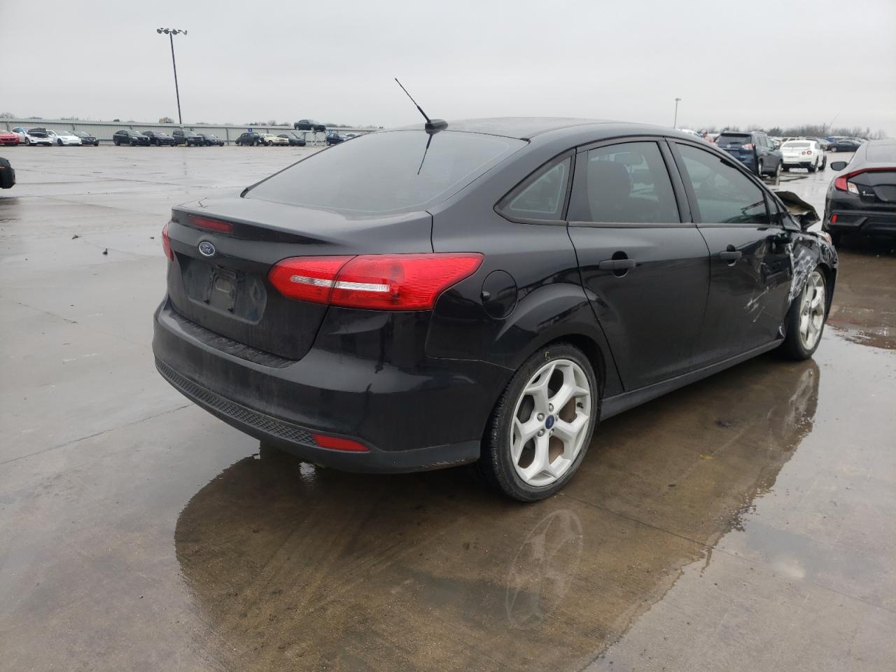 Photo 4 from auction – 2016 FORD FOCUS S with VIN 1FADP3E2XGL208703