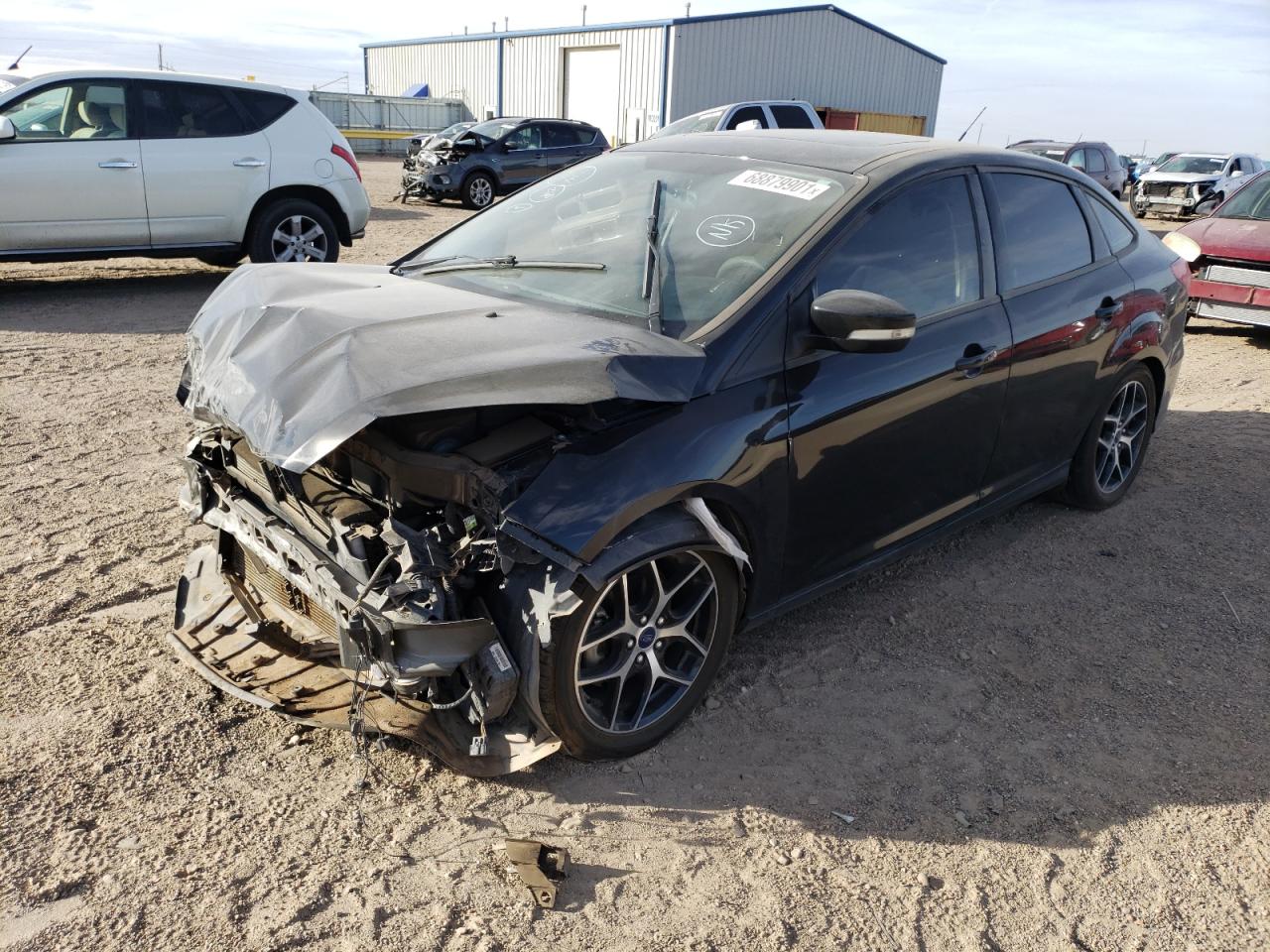 Photo 2 from auction – 2017 FORD FOCUS SEL with VIN 1FADP3H25HL307863