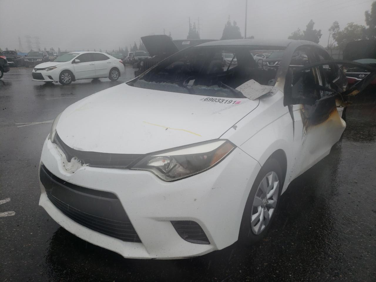 Photo 2 from auction – 2015 TOYOTA COROLLA L with VIN 5YFBURHE1FP323215