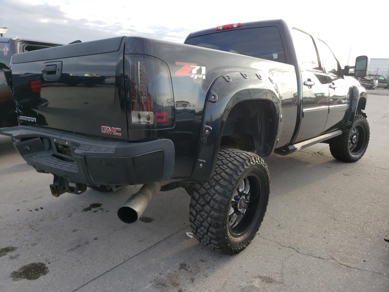 Photo 4 from auction – 2014 GMC SIERRA K25 with VIN 1GT125E81EF163898