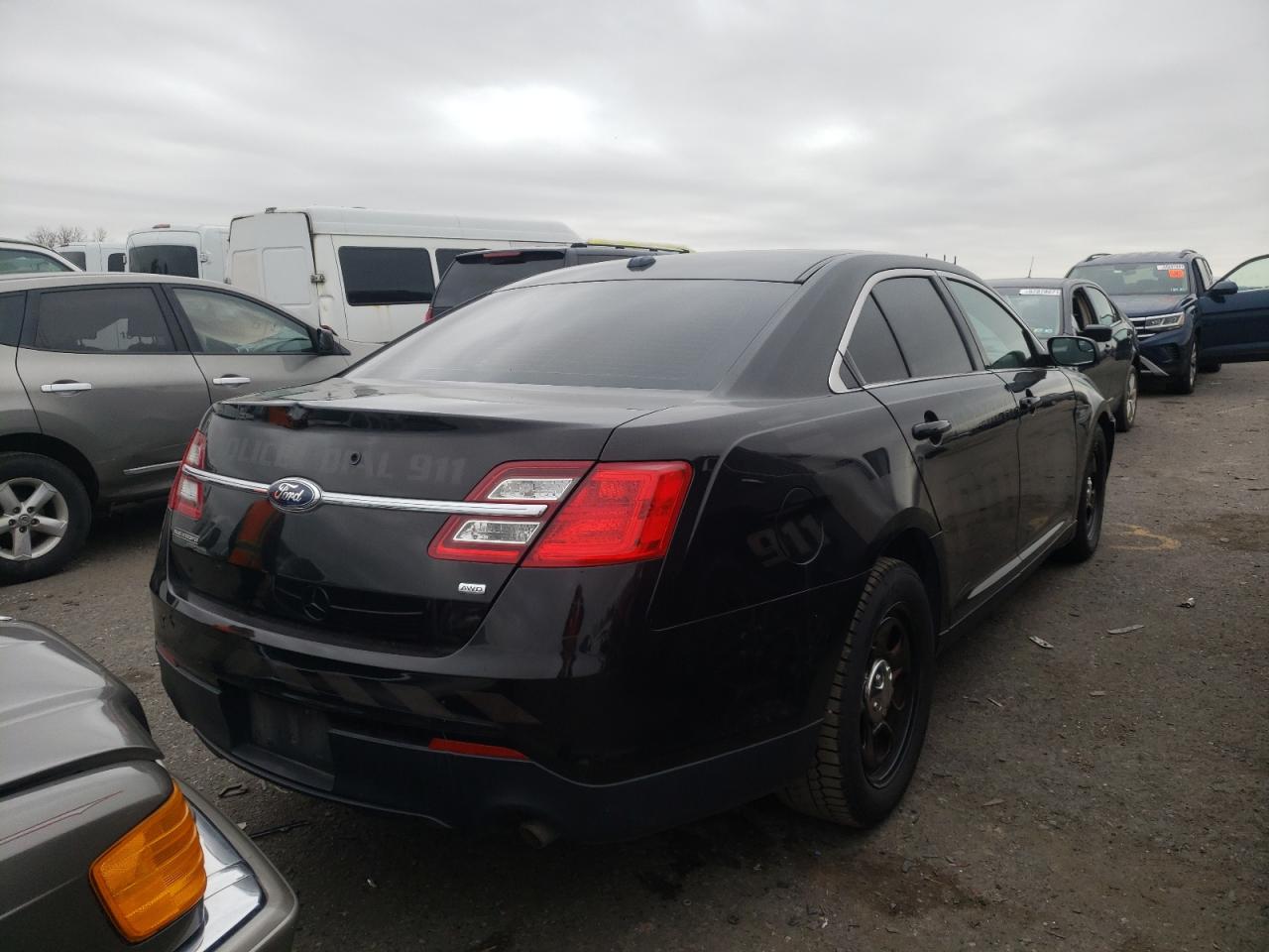 Photo 4 from auction – 2014 FORD TAURUS POL with VIN 1FAHP2MK2EG125950