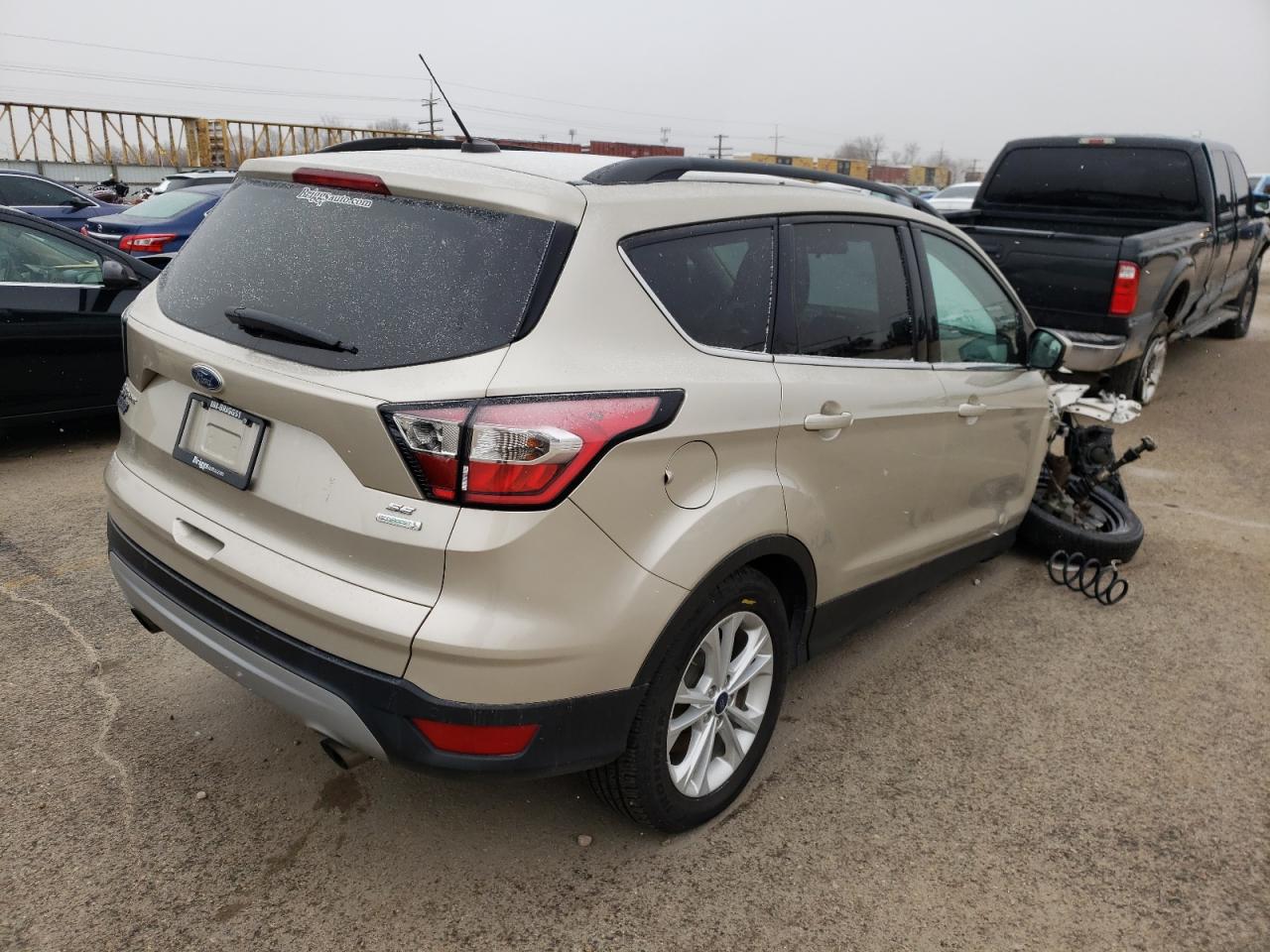 Photo 4 from auction – 2017 FORD ESCAPE SE with VIN 1FMCU0GD5HUB80120