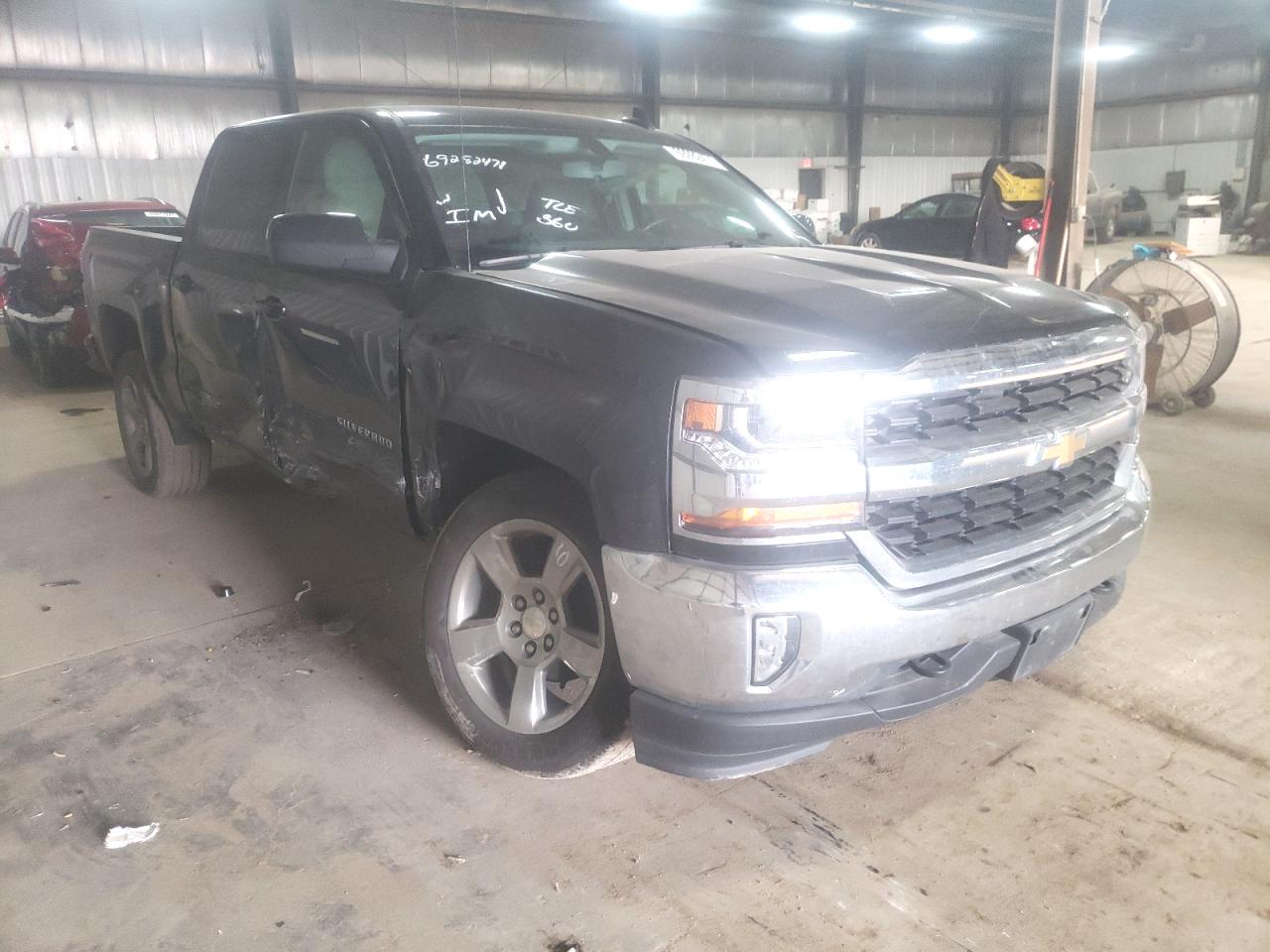 CHEVROLET SILVERADO 2018 with VIN 3GCUKREC3JG342879 - Photo from auction