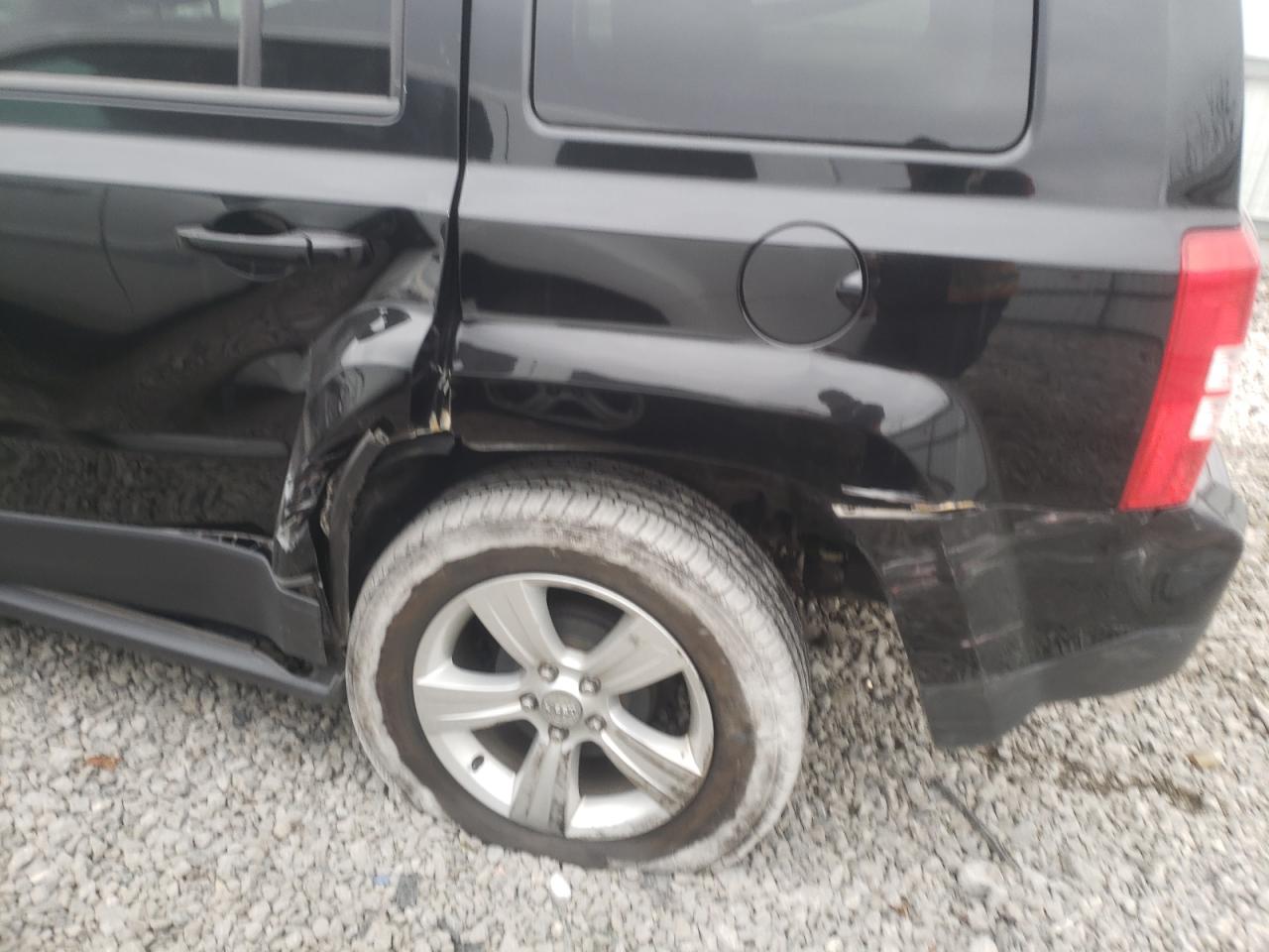 Photo 9 from auction – 2014 JEEP PATRIOT SP with VIN 1C4NJPBB6ED671277