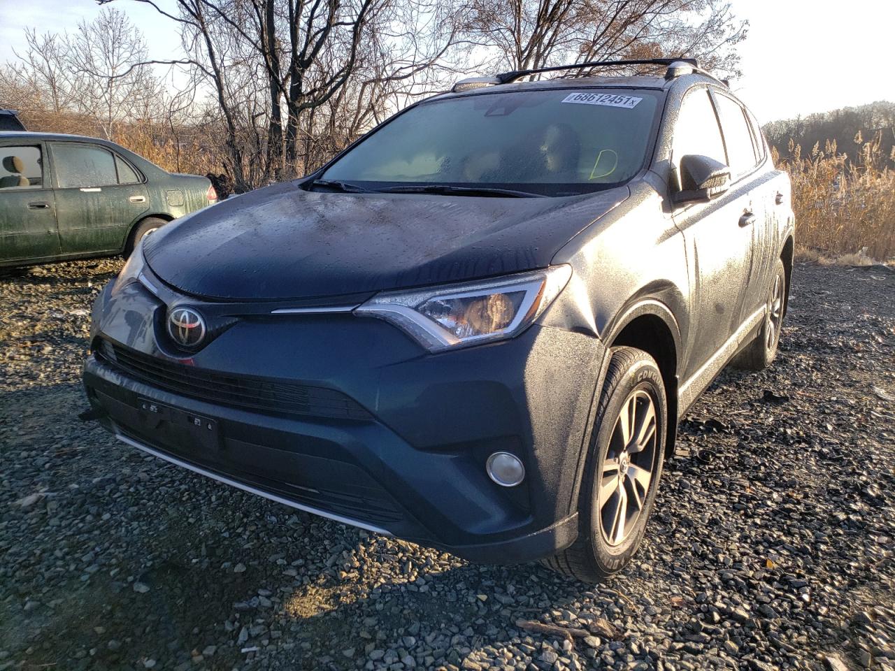 Photo 2 from auction – 2018 TOYOTA RAV4 ADVEN with VIN JTMRFREV9JJ207142