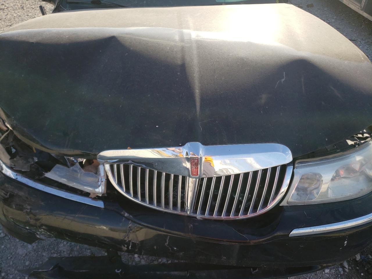 Photo 7 from auction – 2001 LINCOLN TOWN CAR E with VIN 1L1FM81W21Y668351