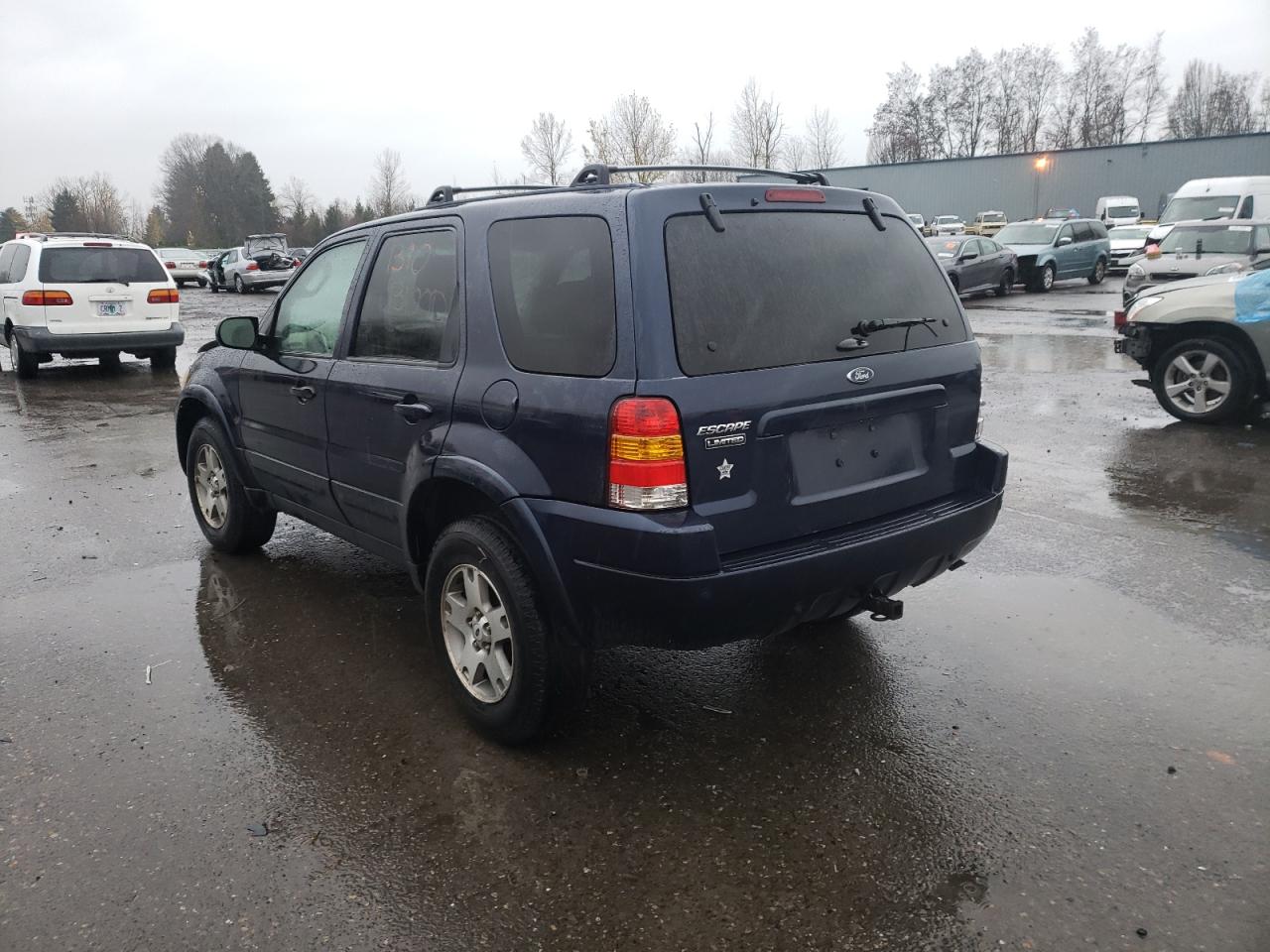 Photo 3 from auction – 2004 FORD ESCAPE LIM with VIN 1FMCU94144KA30875