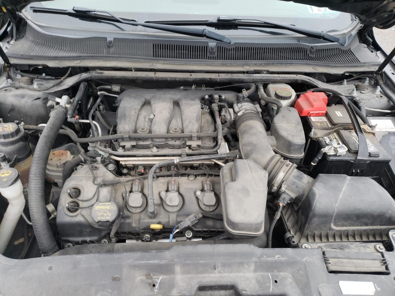 Photo 7 from auction – 2014 FORD TAURUS POL with VIN 1FAHP2MK2EG125950