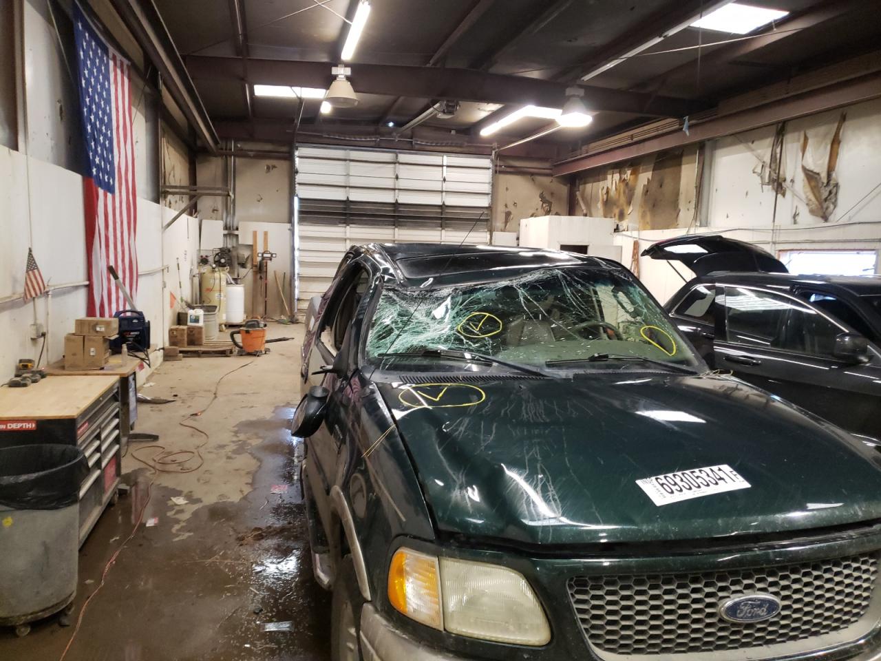 Photo 9 from auction – 2002 FORD F150 with VIN 1FTRX18L02NB47786