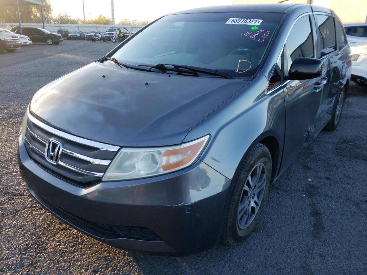 Photo 2 from auction – 2011 HONDA ODYSSEY EX with VIN 5FNRL5H42BB034870