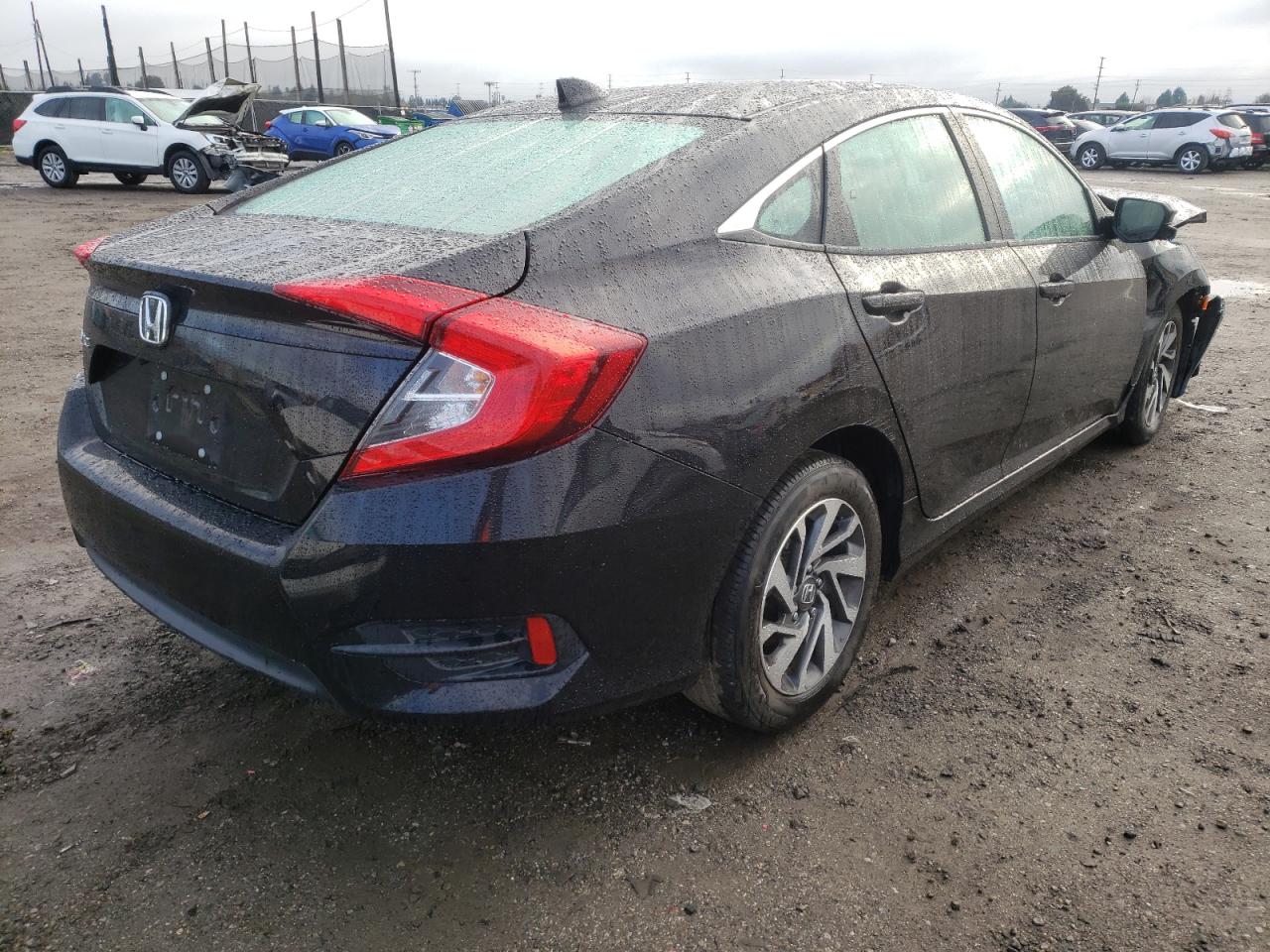 Photo 4 from auction – 2018 HONDA CIVIC EX with VIN 19XFC2F76JE201430
