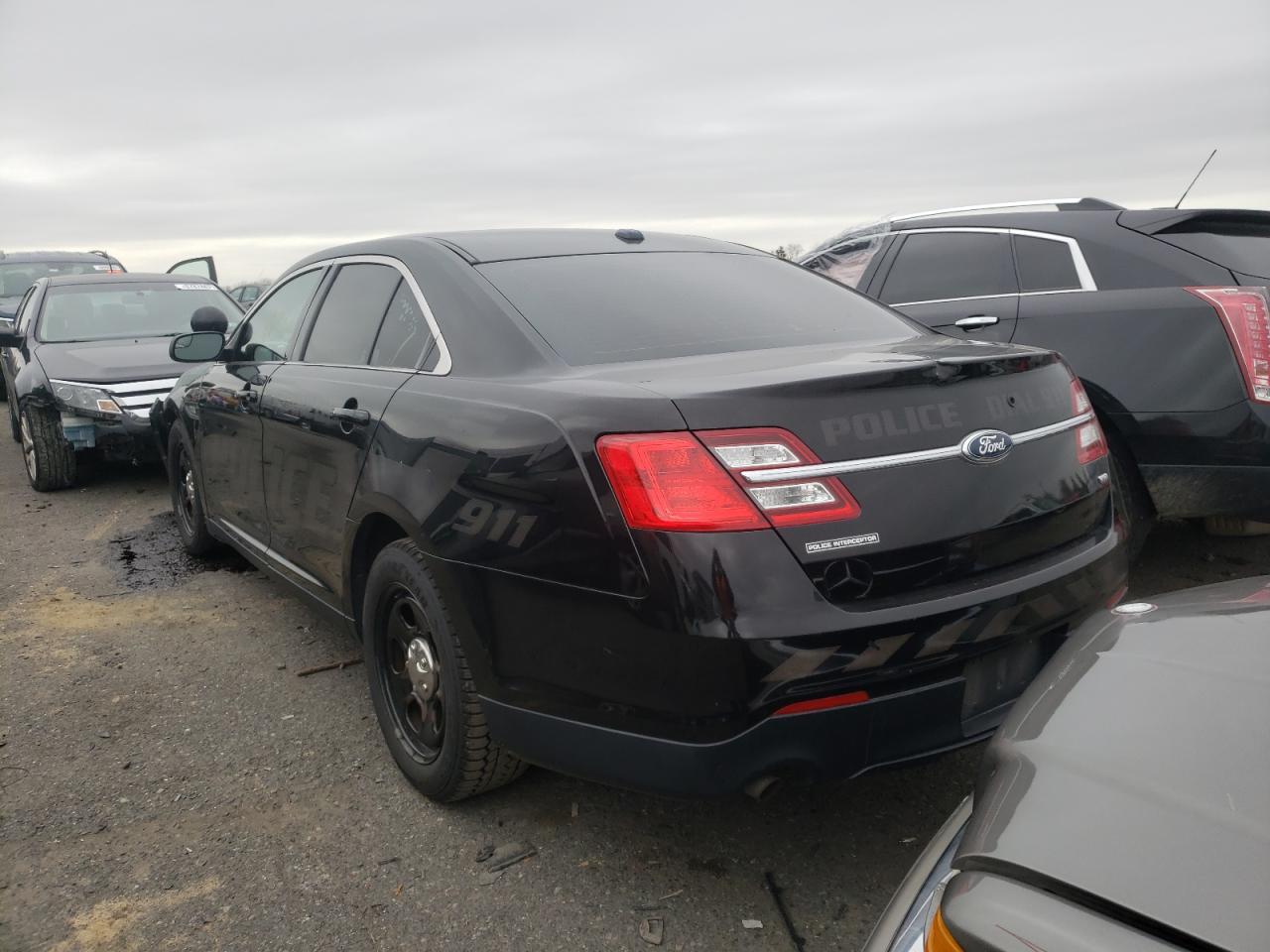 Photo 3 from auction – 2014 FORD TAURUS POL with VIN 1FAHP2MK2EG125950