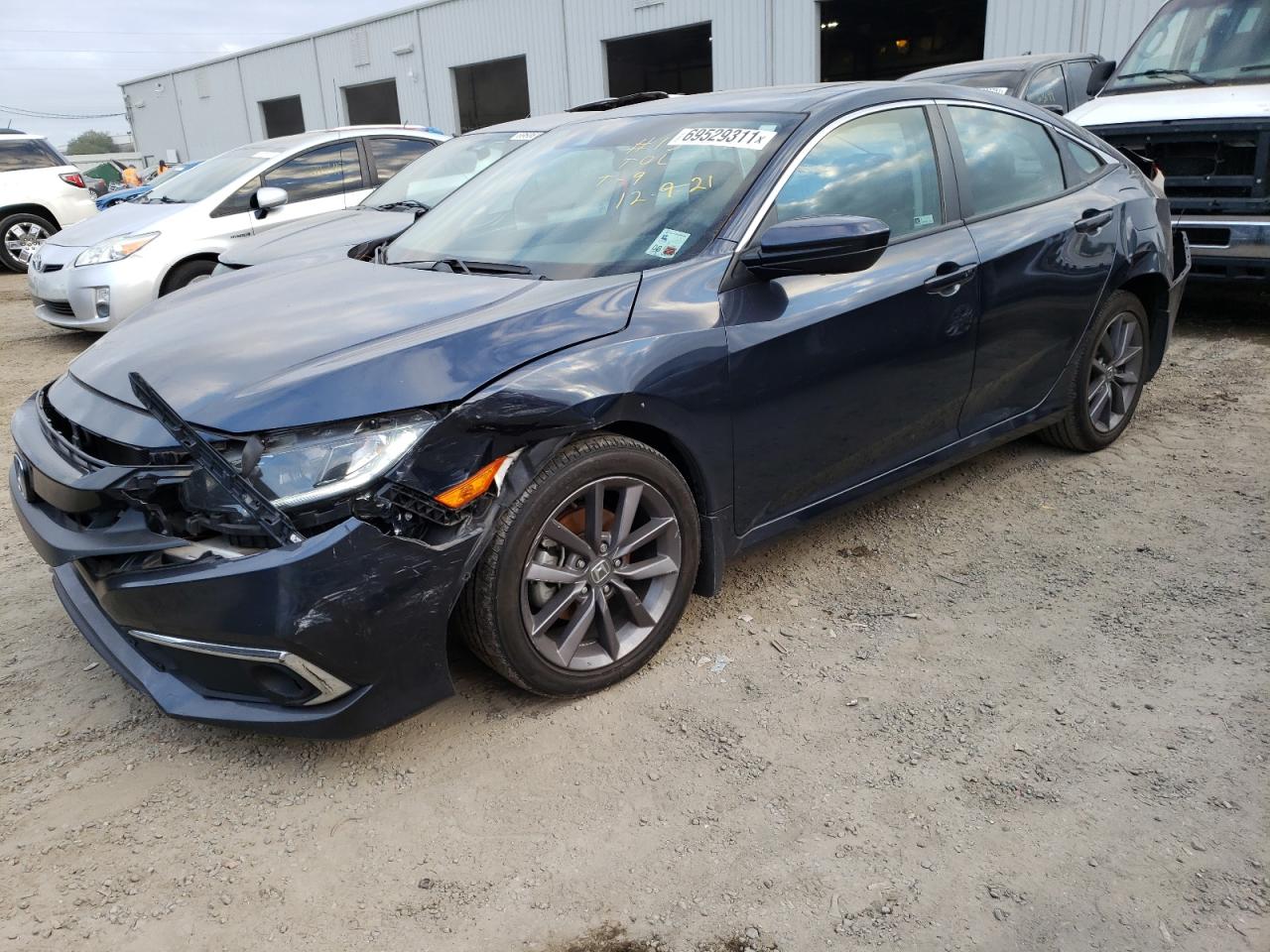 Photo 2 from auction – 2020 HONDA CIVIC EX with VIN 19XFC1F35LE001763