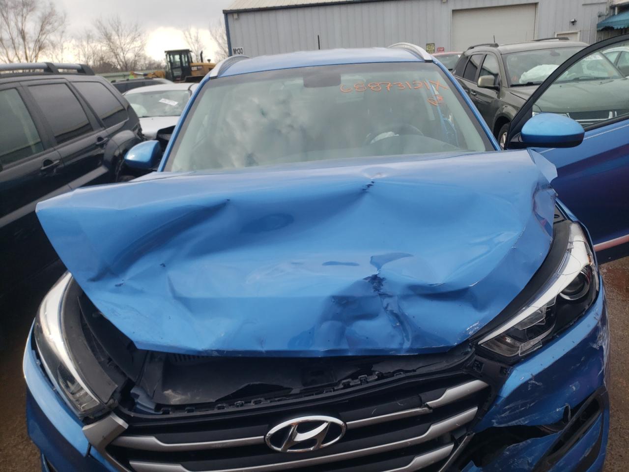 Photo 7 from auction – 2017 HYUNDAI TUCSON LIM with VIN KM8J33A42HU467452