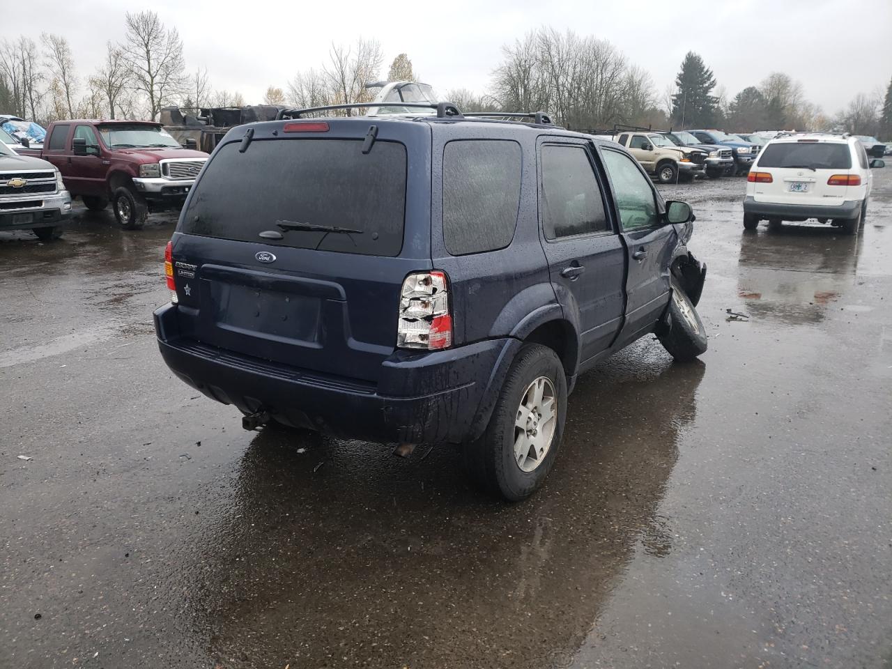 Photo 4 from auction – 2004 FORD ESCAPE LIM with VIN 1FMCU94144KA30875
